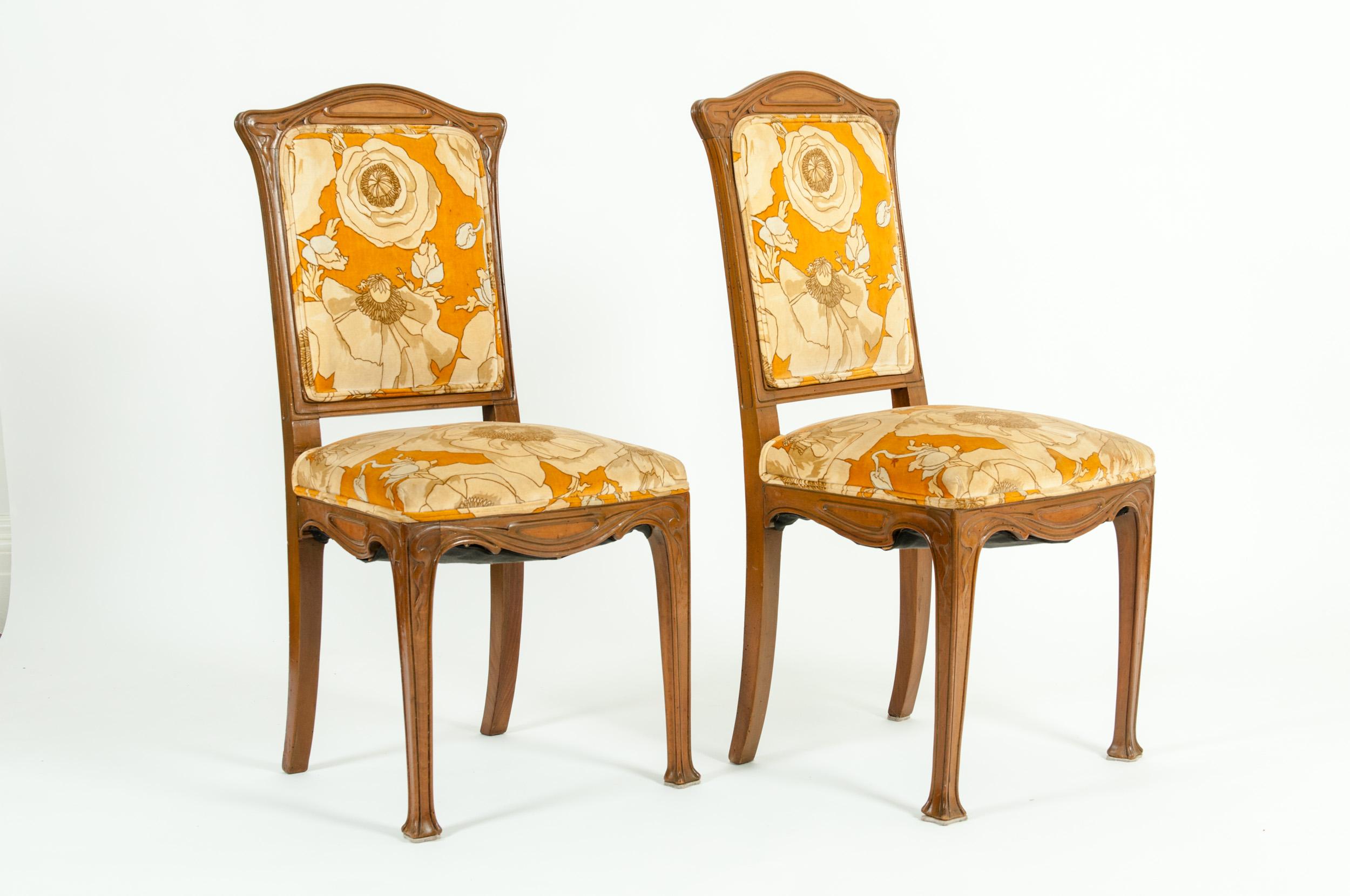 Early 20th century Louis Majorelle pair side chair . Each piece is in great vintage condition with appropriate wear consistent with age / use . Each is about 37 inches high x 15.5 inches deep x seat high 17 inches.