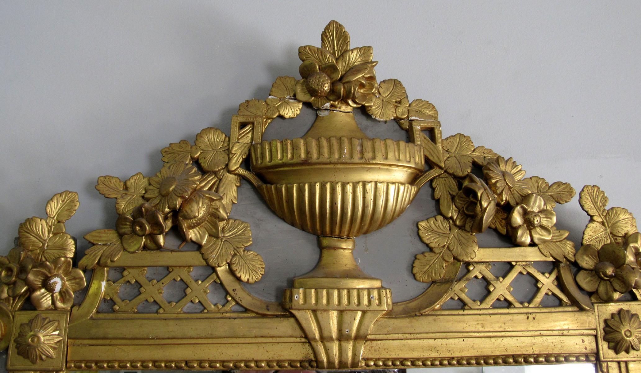 Very fine, delicately proportioned, carved, giltwood and parcel-gilt, Louis XV Style mirror.