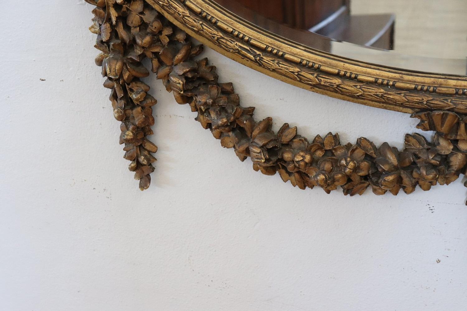 Hand-Carved Early 20th Century Louis XVI Style Carved and Gilded Wood Oval Wall Mirror