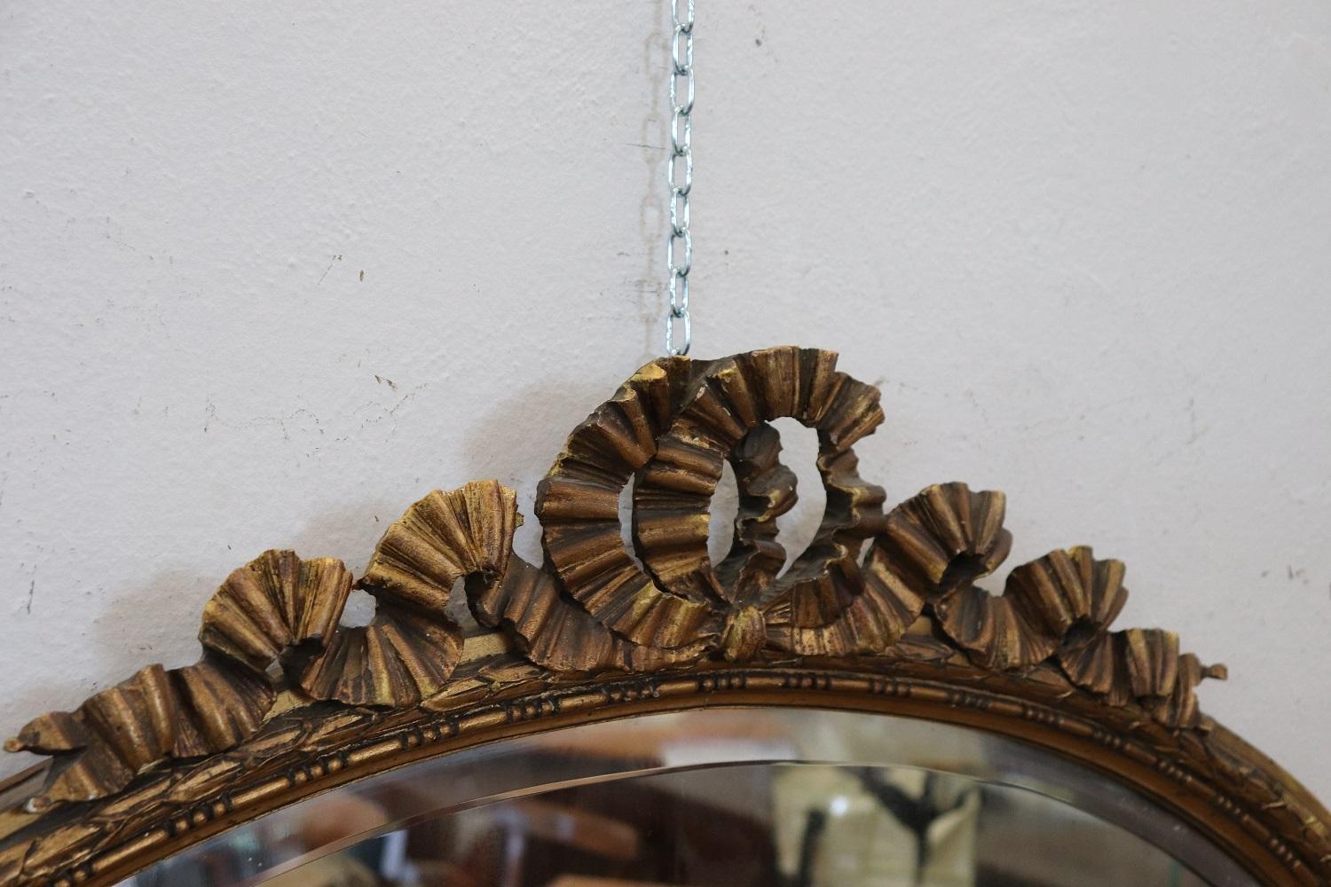 Early 20th Century Louis XVI Style Carved and Gilded Wood Oval Wall Mirror 1
