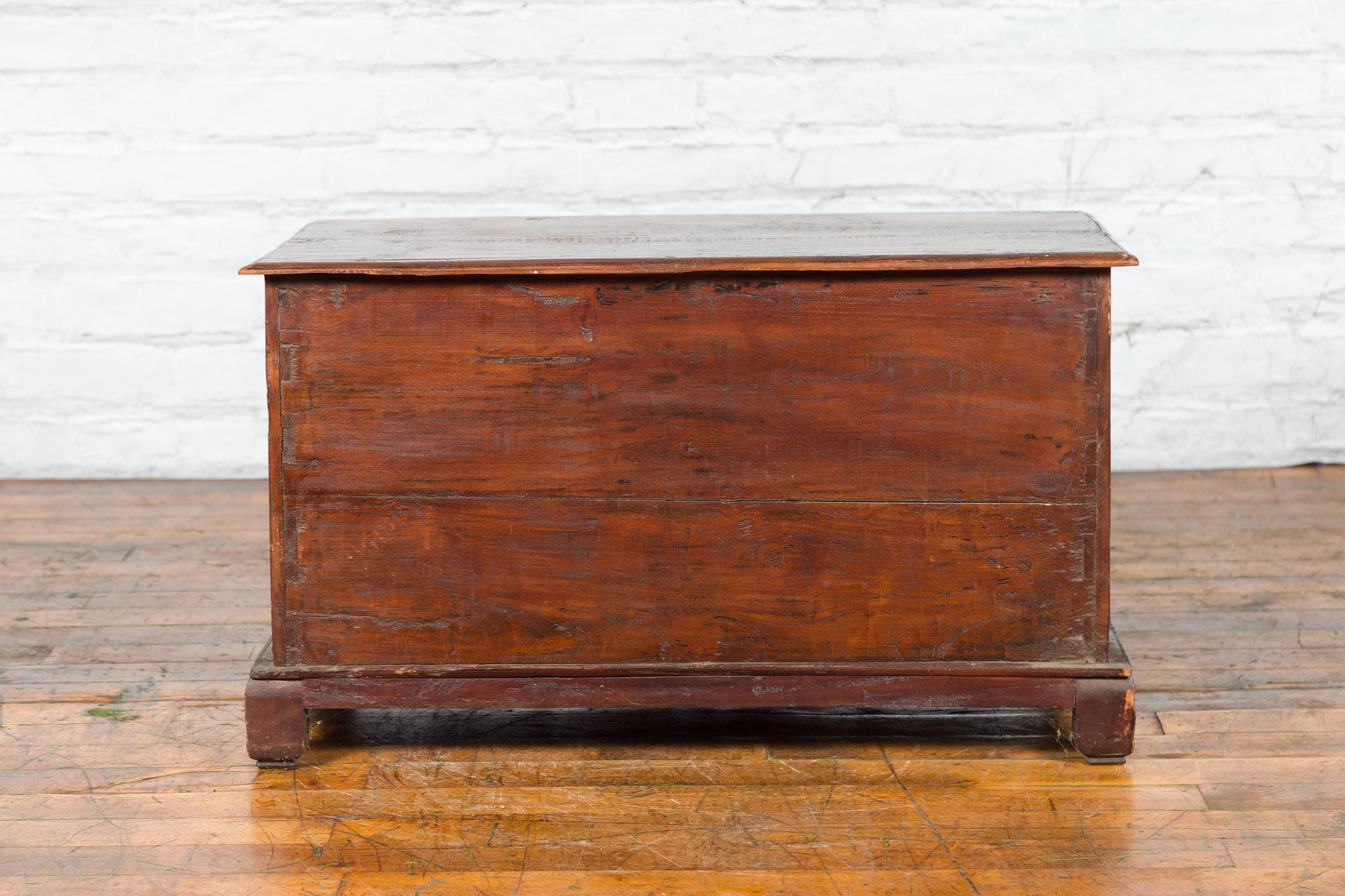 Early 20th Century Madurese Treasure Chest with Hand-Carved Floral Décor For Sale 10