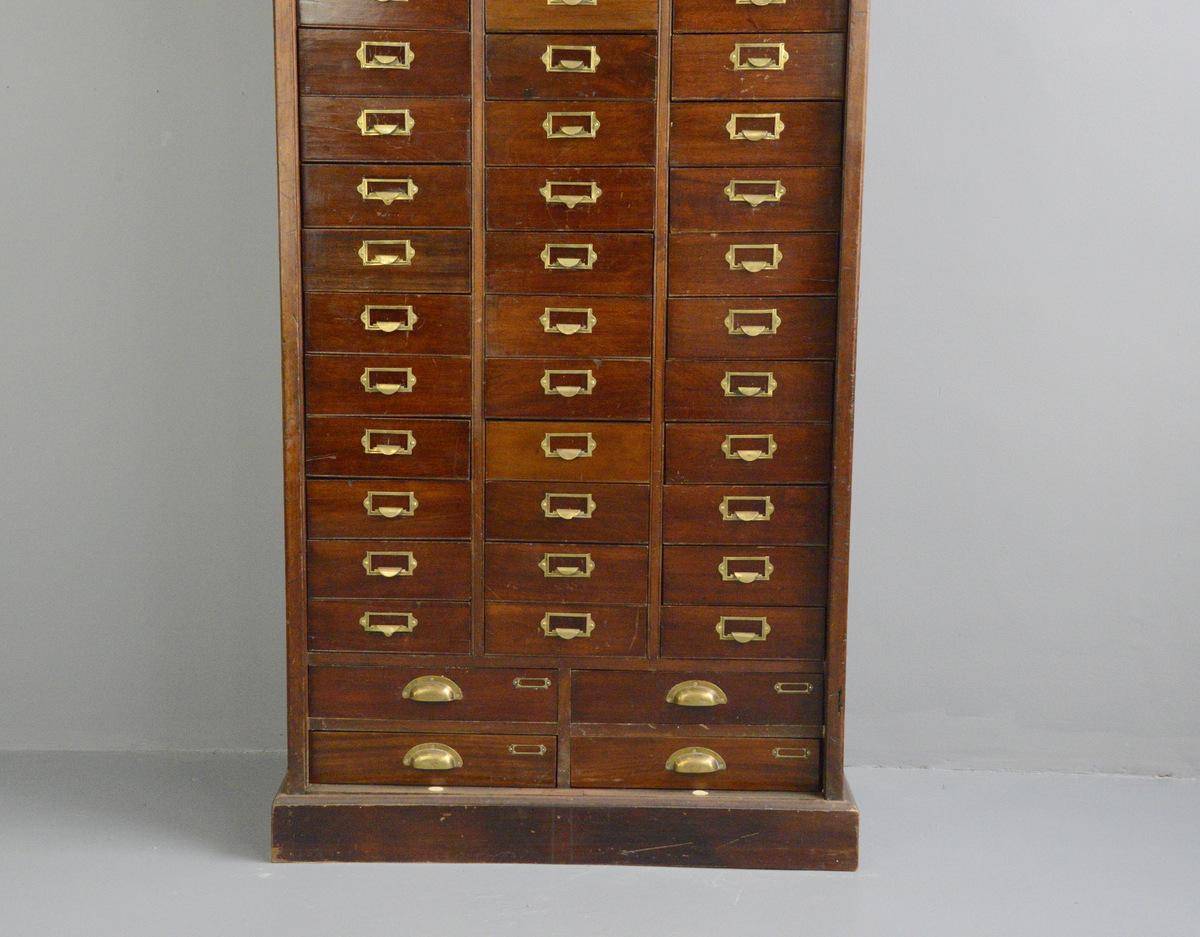 Early 20th century mahogany solicitors drawers

- Mahogany drawers
- Paneled sides and back
- Original brass pulls
- Original sprung documents holder in the drawers
- English, 1900
- Measures: 91cm wide x 57cm deep x 208cm tall
- The 4 large