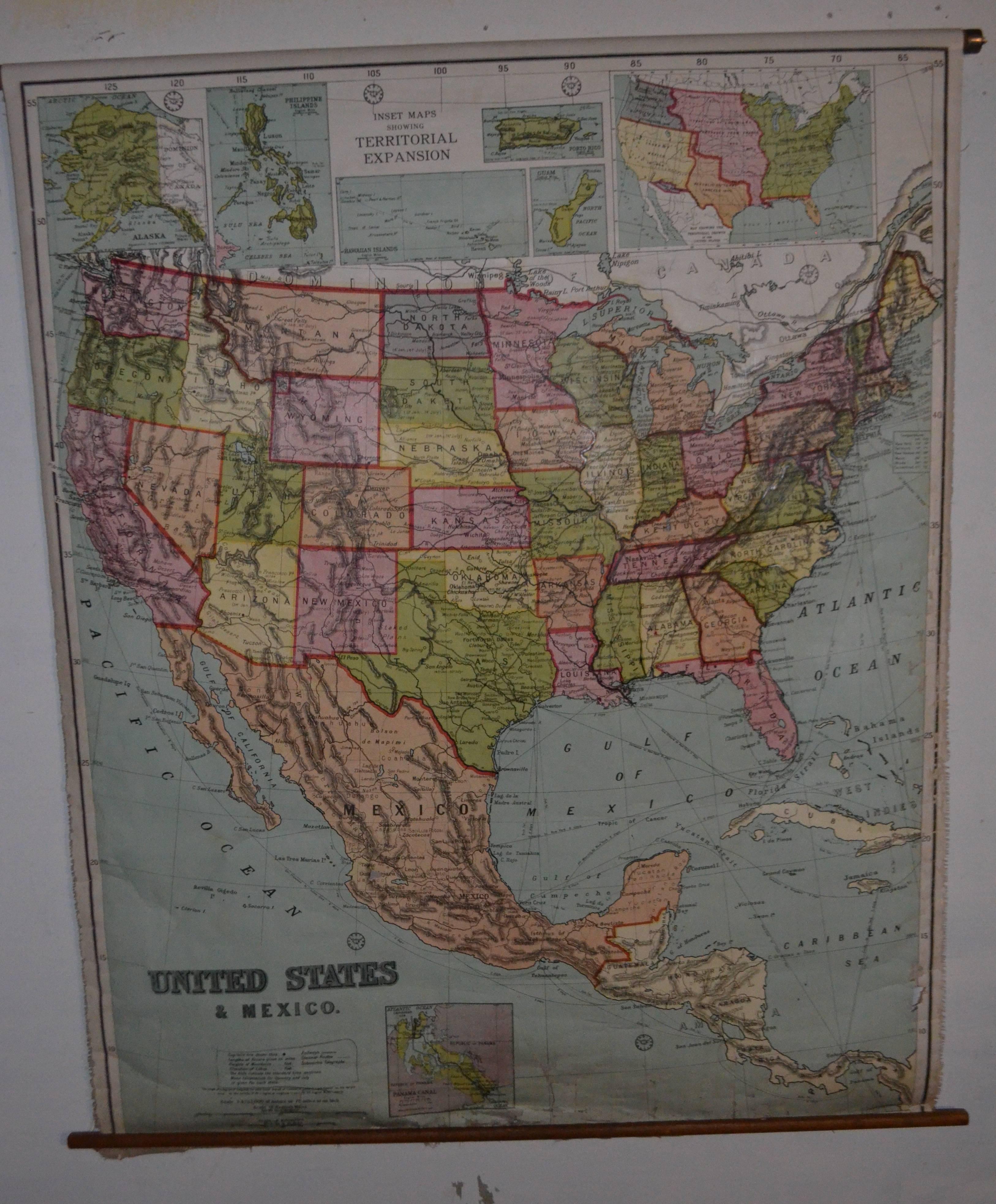 Early 20th century map of the United States and Mexico. This 1916 edition, on retractable wooden roller, was printed in Edinburgh, Scotland around the time the U.S. entered World War I after much debate and reluctance. Despite its 100-plus year age,