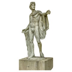 Escultura de mármol de Apolo Belvedere de principios del siglo XX sobre peana