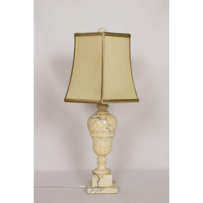 Marble table lamp, restored and rewired, Italian, early 20th Century. Some wear on base. Shade sold separately: 75-421 PW 17? bronze $189

Dimensions: 
Height 18? to top of socket
Diameter: 5?.