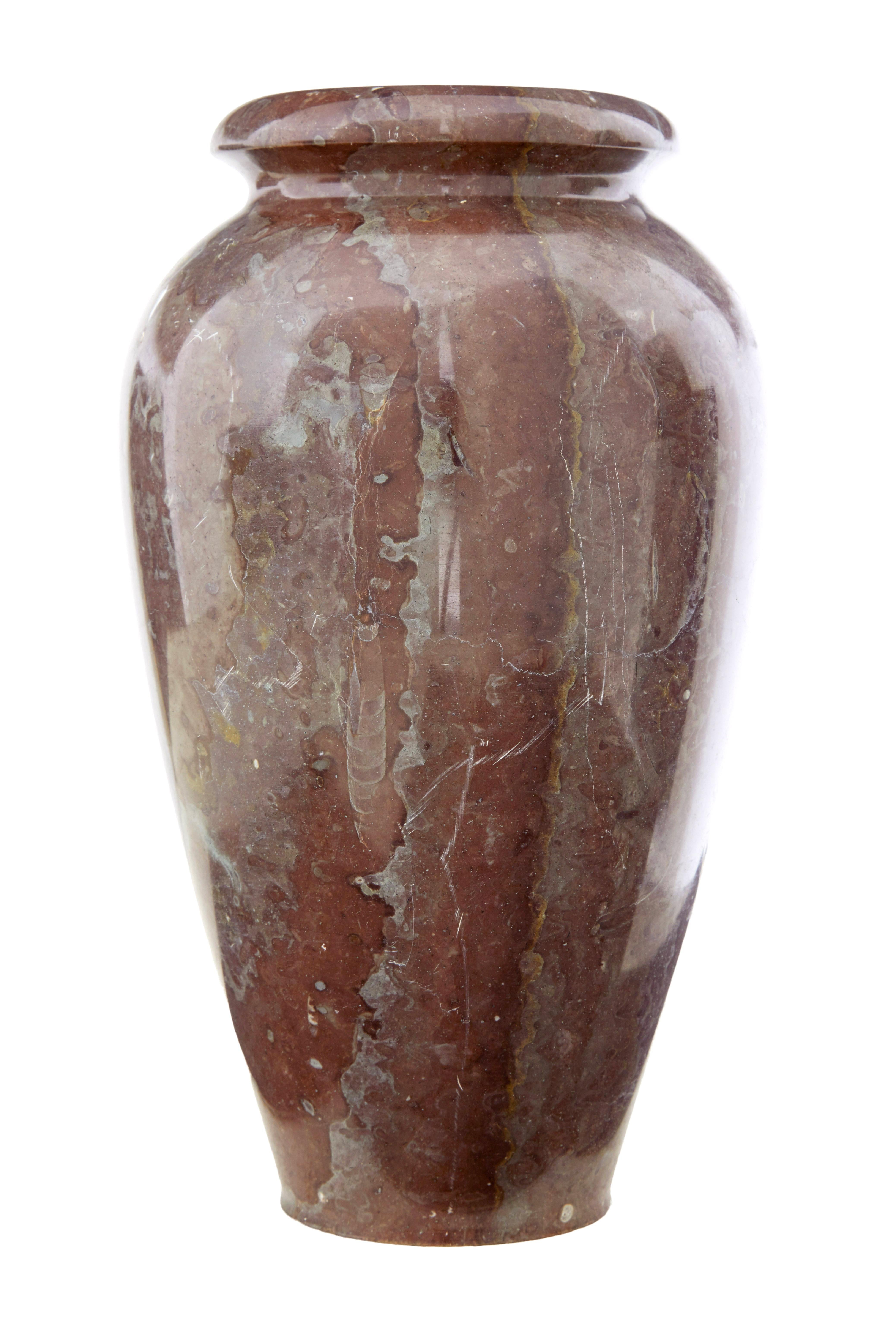 Early 20th century marble vase circa 1920.

Elegant shaped vase in deep reds and greys. Roll top rim.  Ideal for use in multiple rooms around the home, heavy item for size.

Small chips to base.