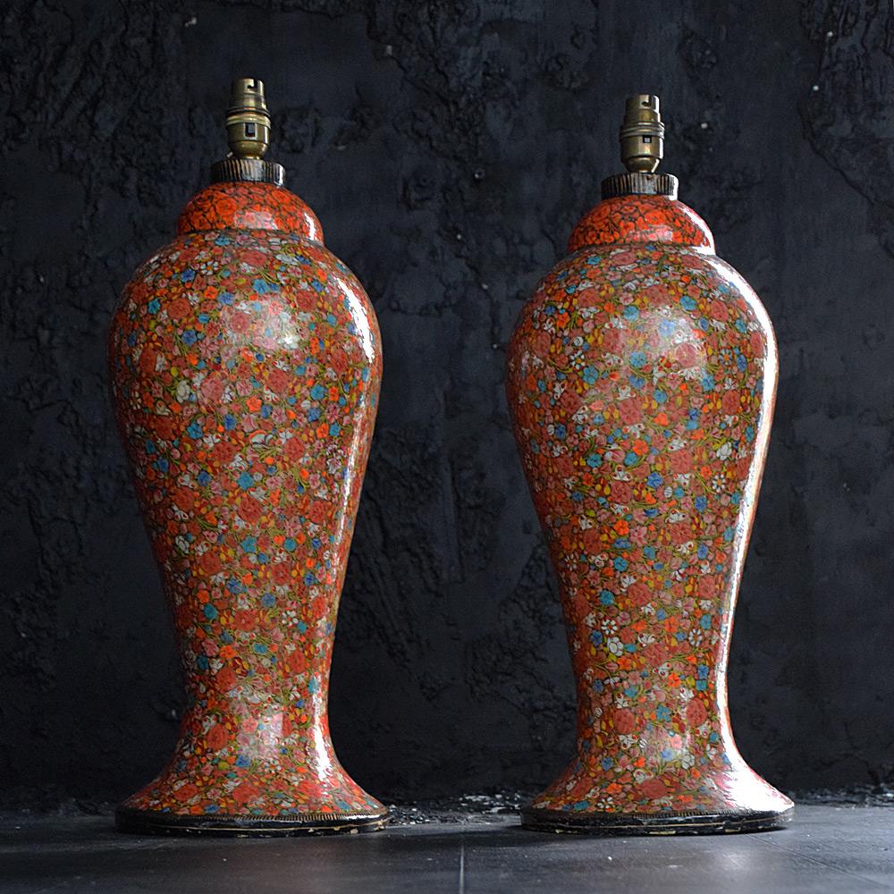 Early 20th century matched pair Kashmir lamps 

We are proud to offer a highly decorative and unique matched pair of early 20th century hand crafted Kashmir lamps. Hand crafted from papier Mache and with exquisite hand painted floral detail