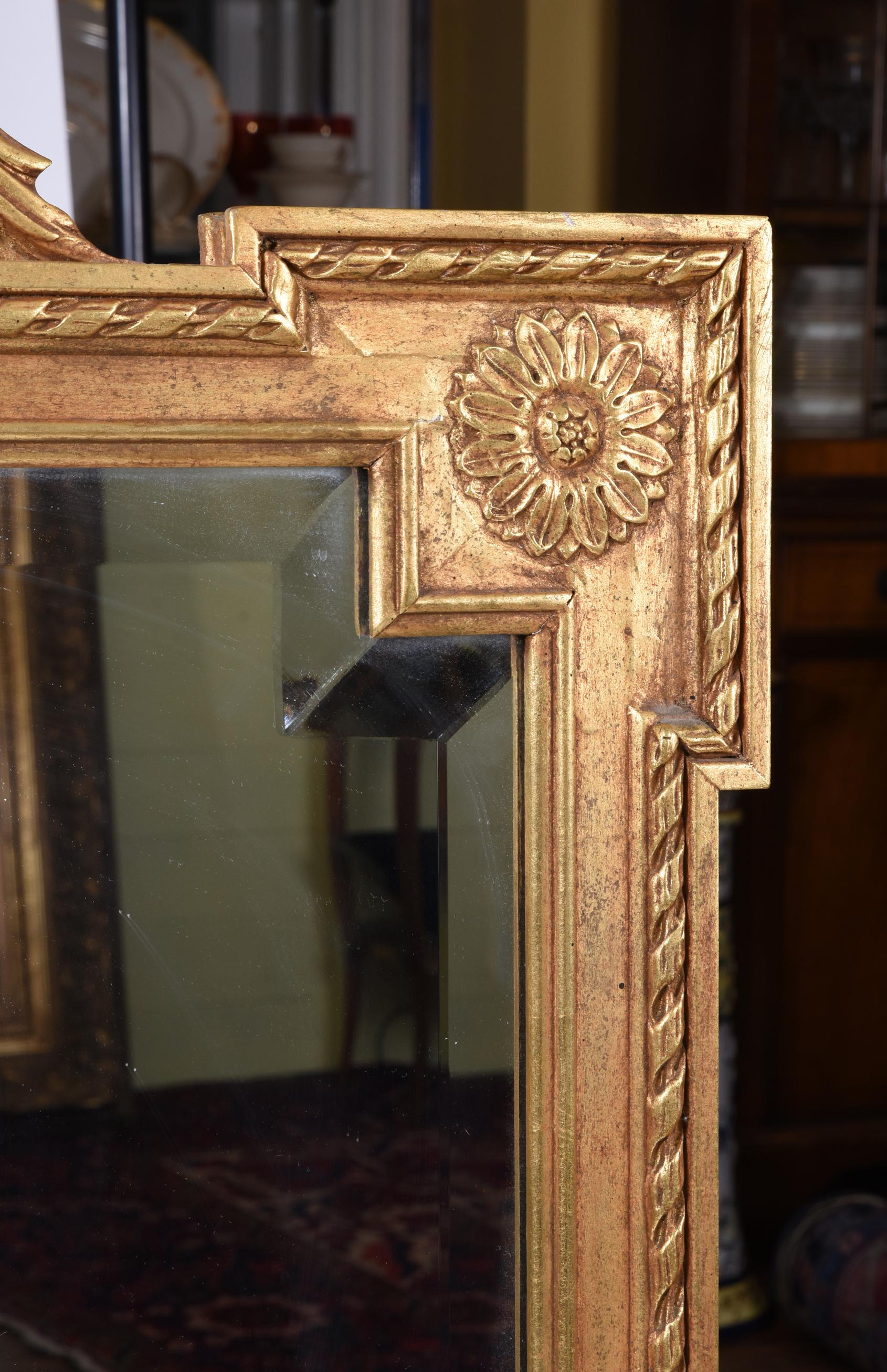 Carved Early 20th Century Matching Pair of Giltwood Hanging Beveled Mirrors