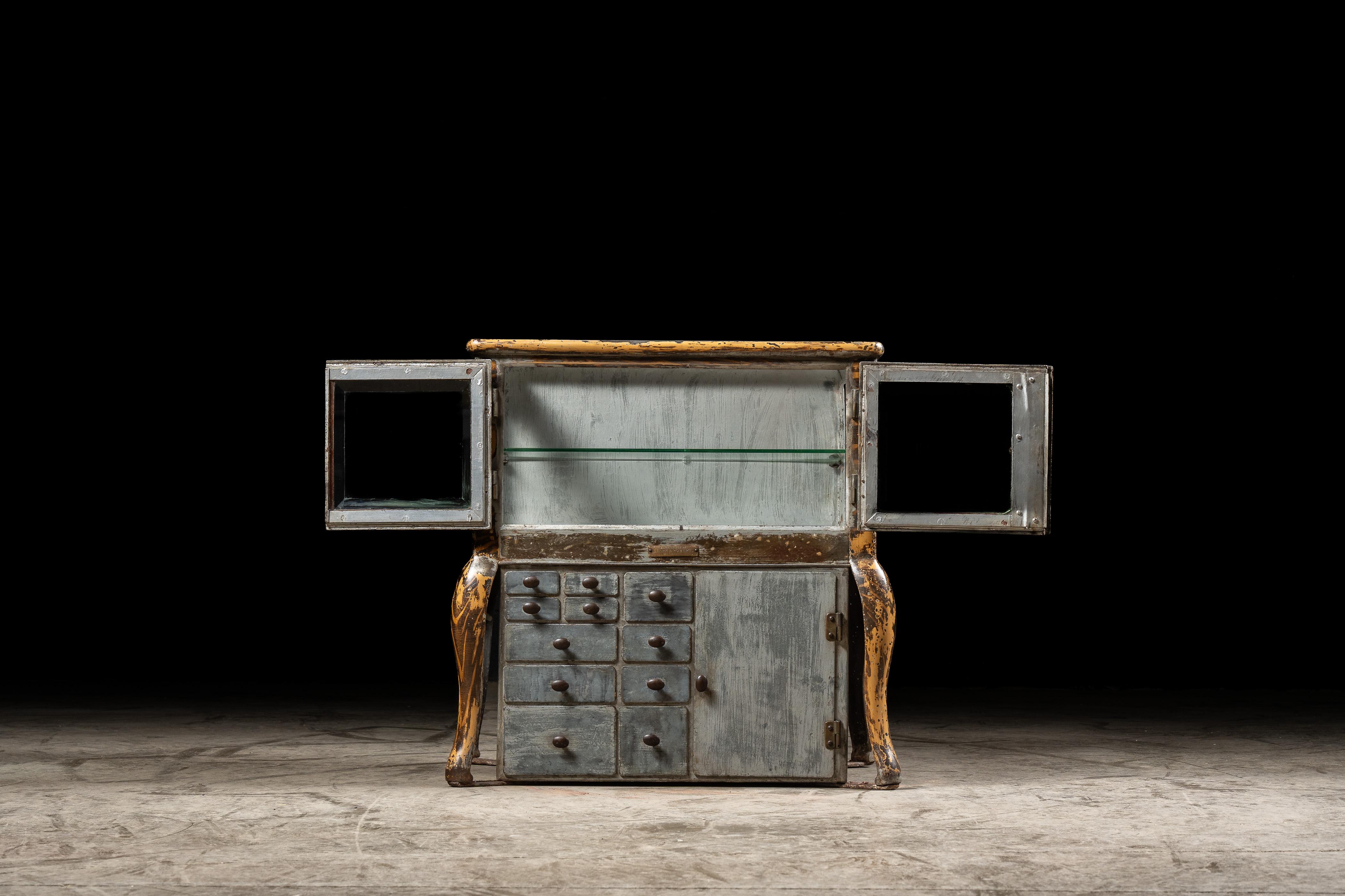 Early 20th Century Medical Display Case by Clark & Roberts In Distressed Condition For Sale In Dekalb, IL