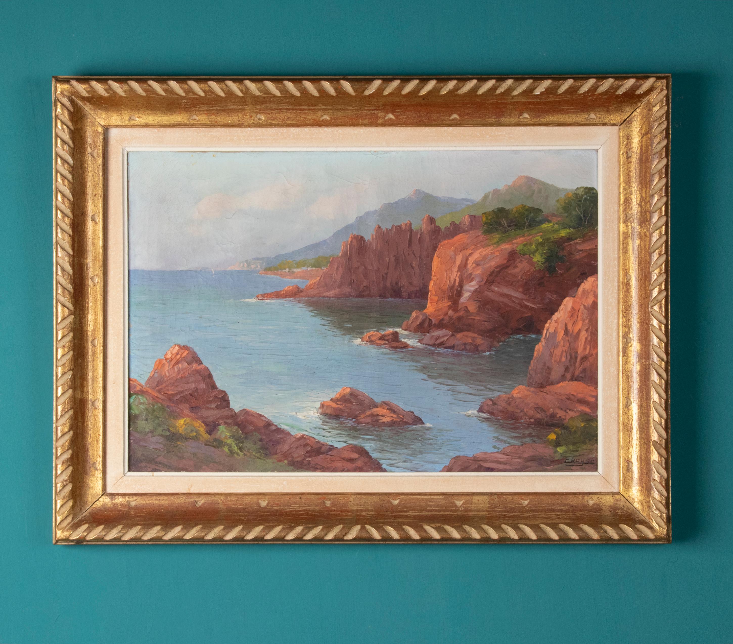 This painting shows a Mediterranean coastal landscape from the French region of Provence on the Cote d'azur. The red rocks that you see in this painting are characteristic of the region. The paint is applied thickly, this provides extra depth in the