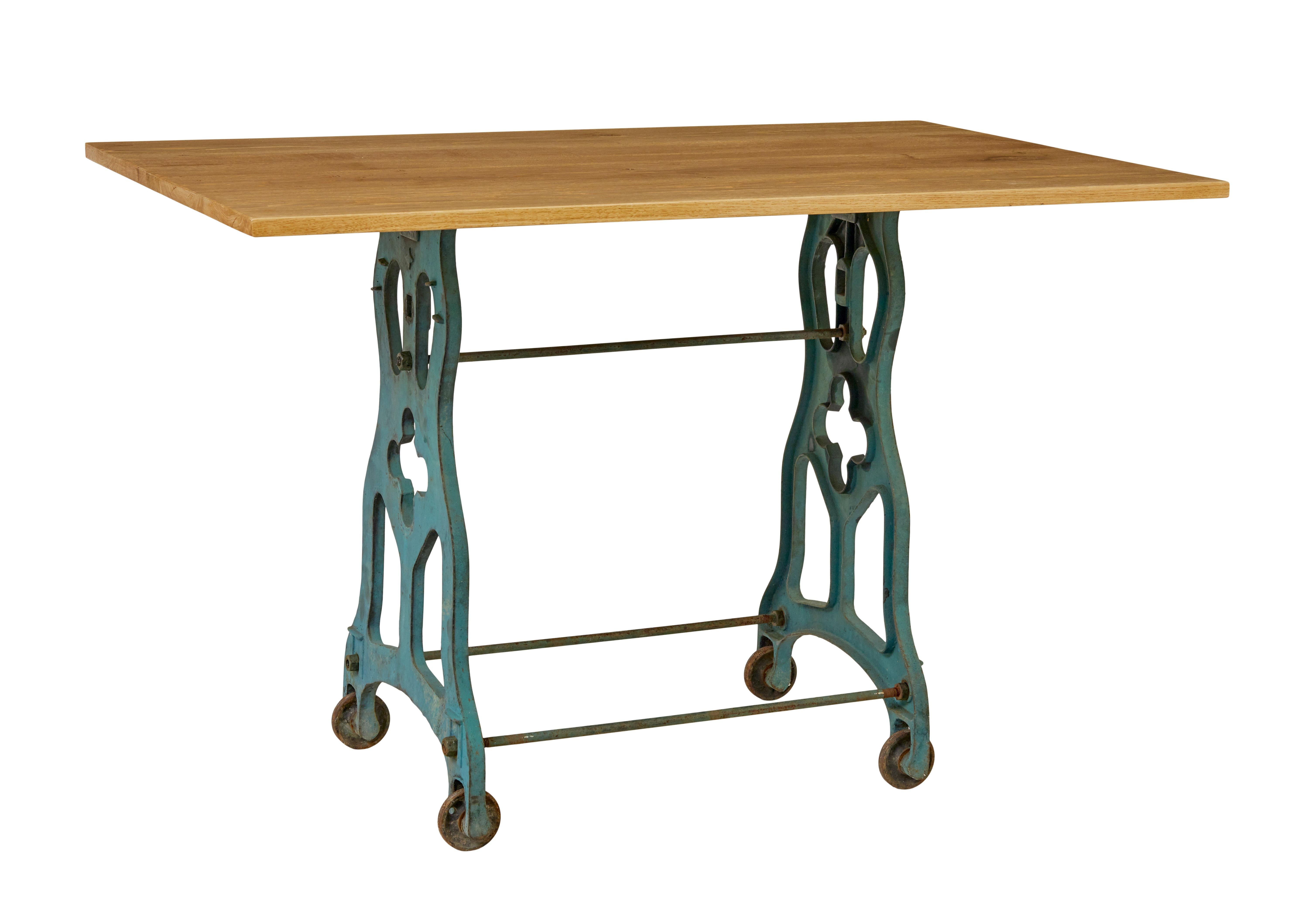 Early 20th century metal table base with solid oak top

Here we present an iron table base with original paint, with later solid oak top.

Good quality table that would work equally well in the hallway or in the garden room.  Cast iron base with