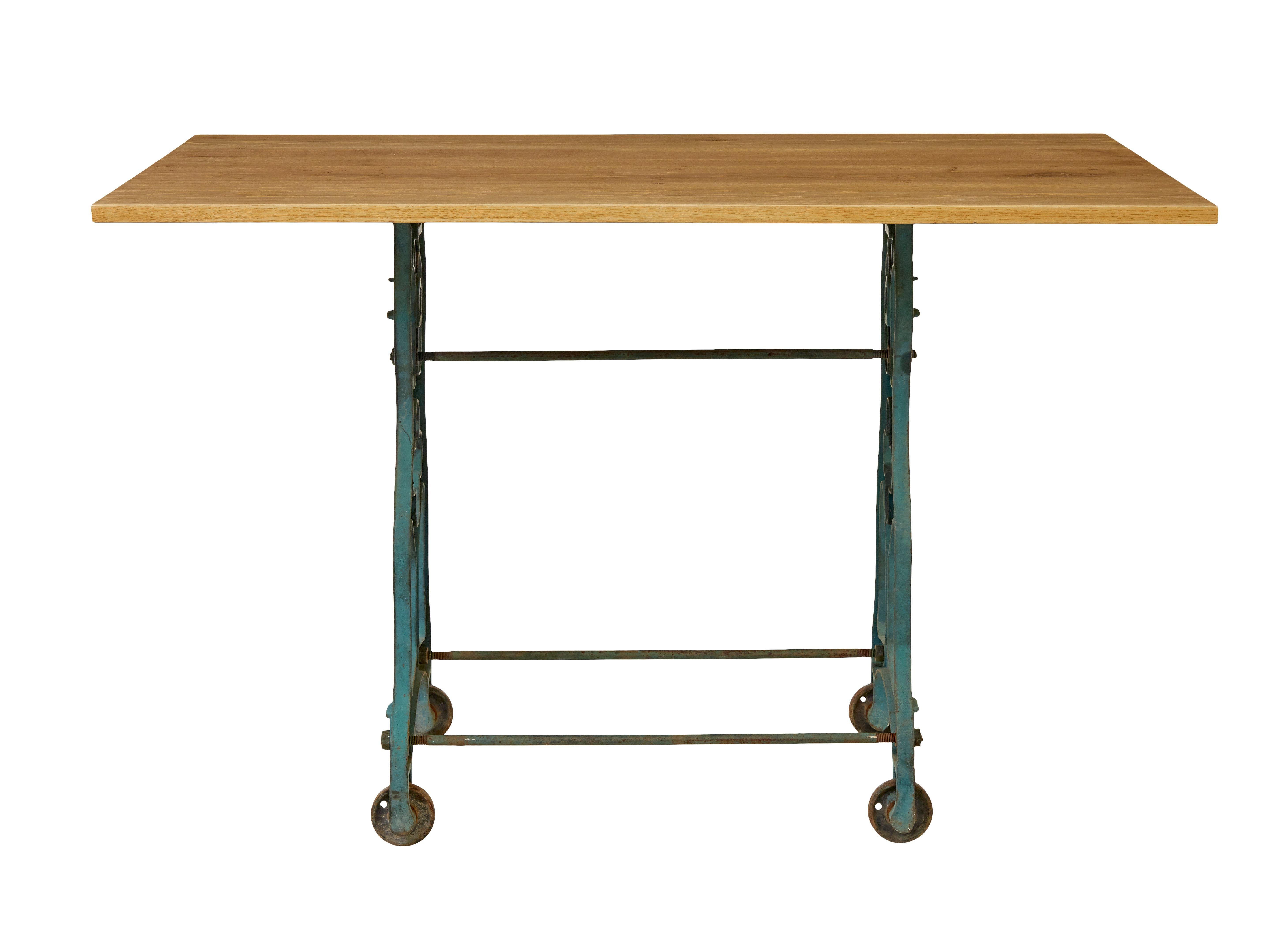Industrial Early 20th century metal table base with solid oak top