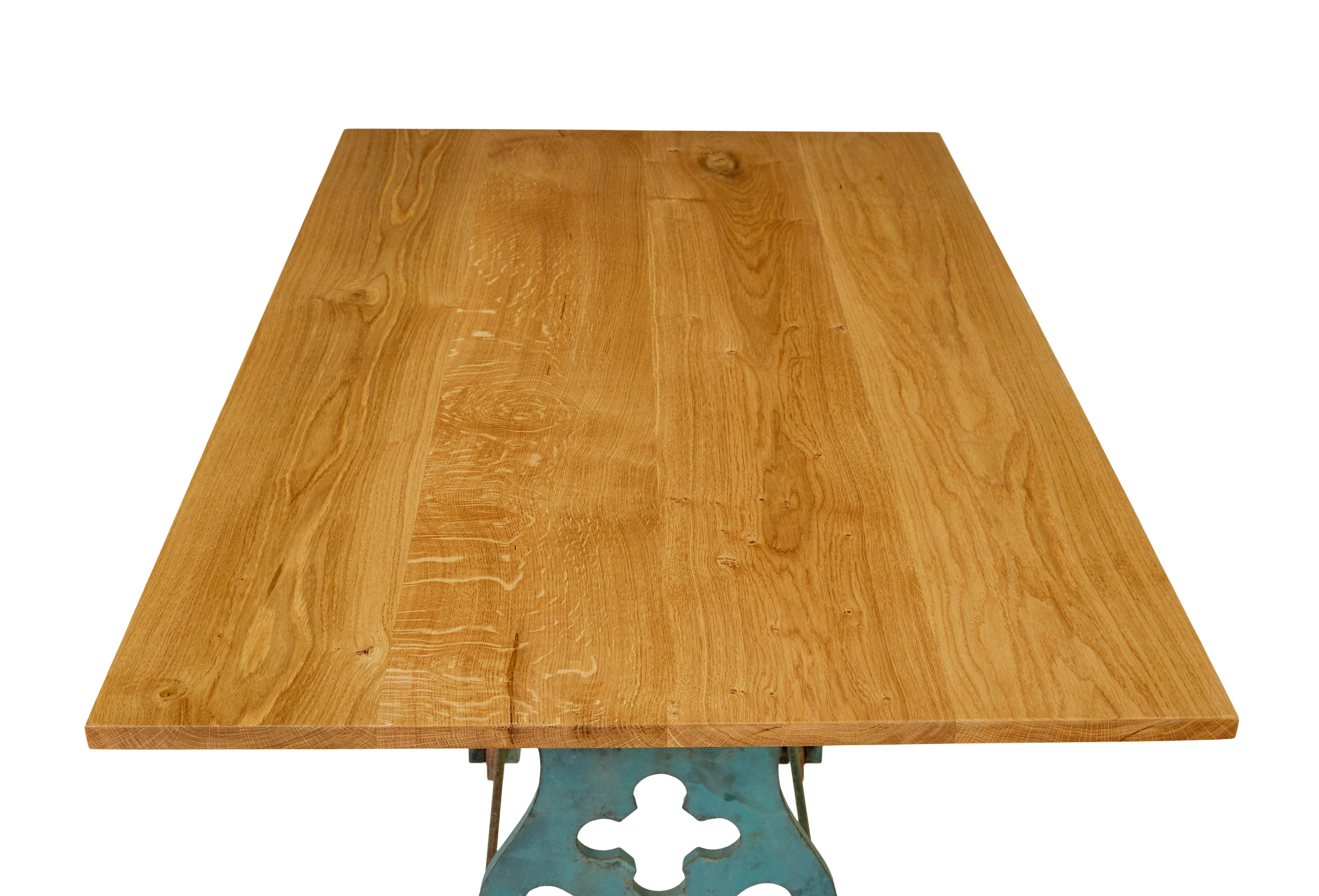 Ferro Early 20th century metal table base with solid oak top in vendita