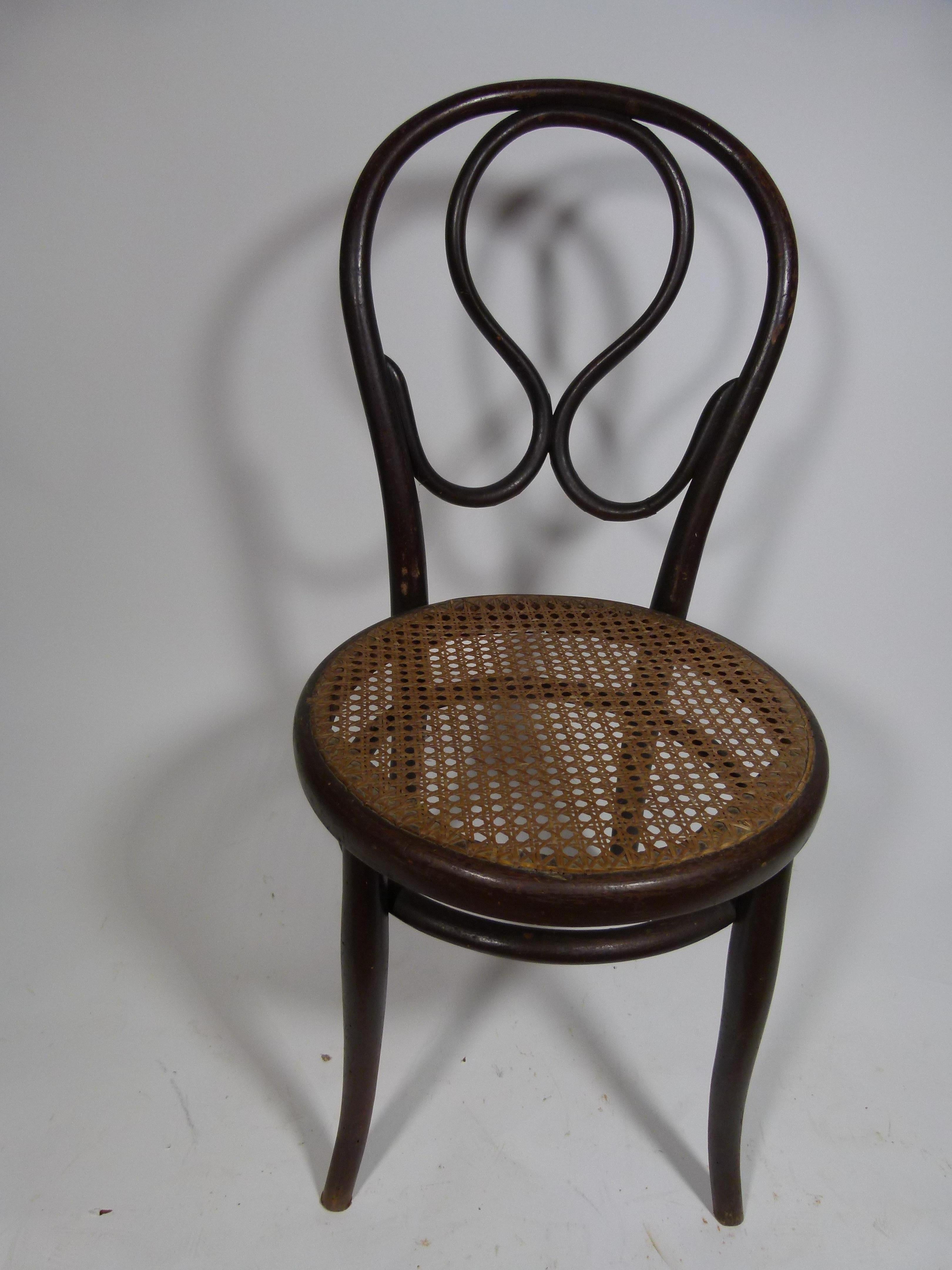 Early 20th century Michael Thonet chair in black color. We only have a last one piece.