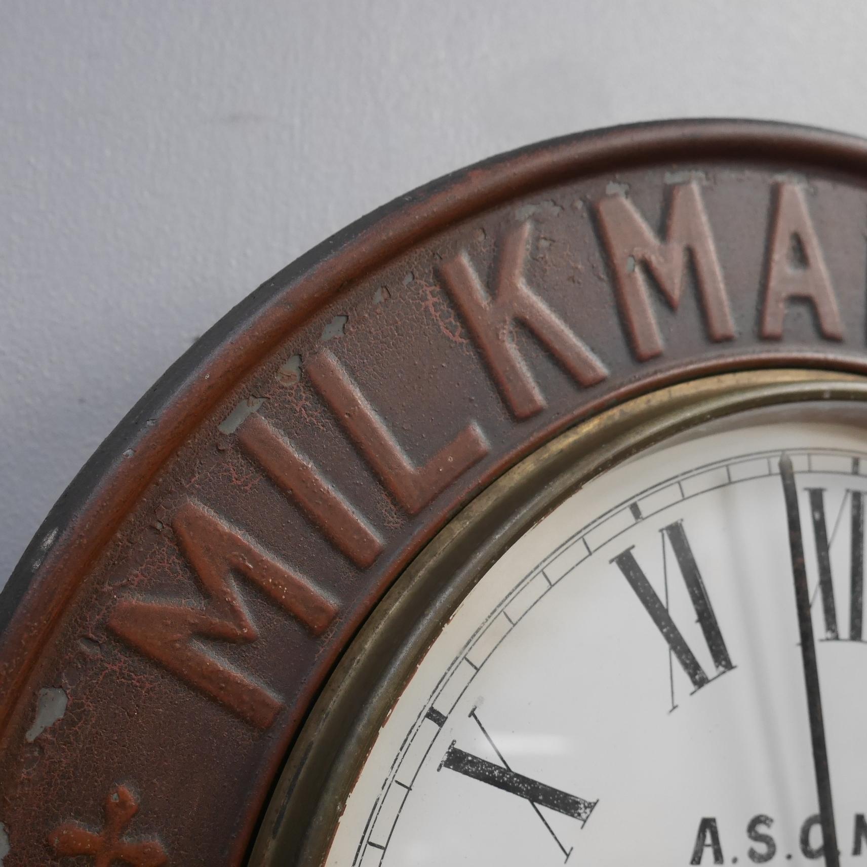 An early English grocer's advertising clock for Milkmaid Milk.
A superb & highly original antique advertising clock, the timber carcass with a pressed tin / zinc surround, finished in original paint. With wonderful age related patina & original