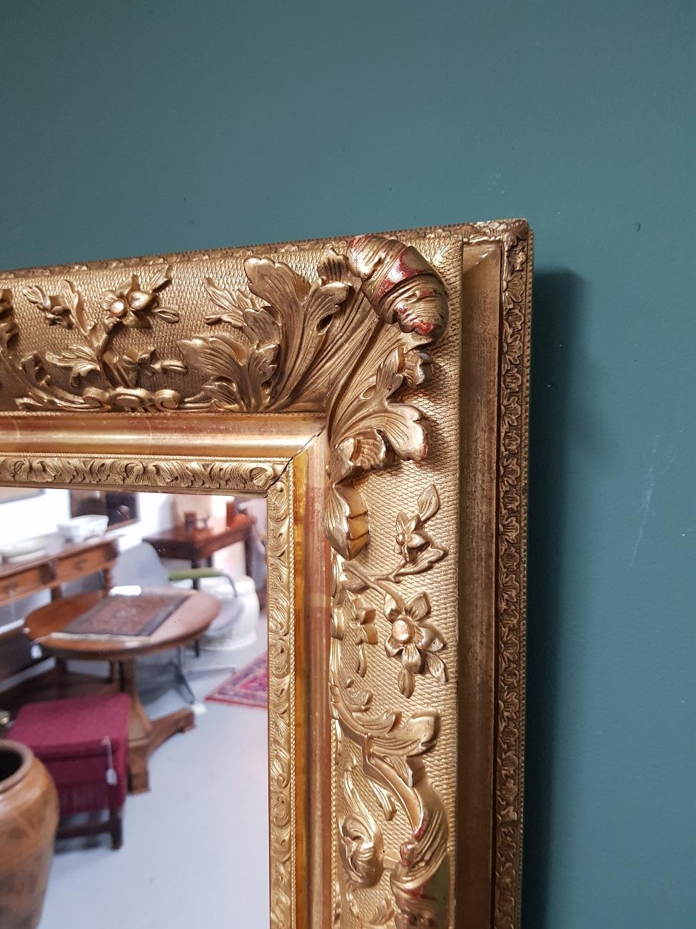 Neoclassical Early 20th Century Mirror in a Capital Gilded Frame For Sale