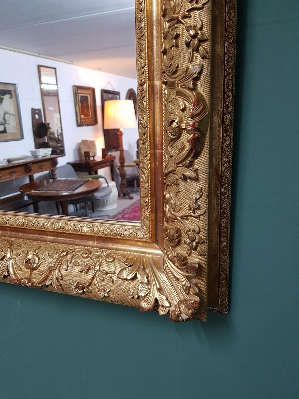 Gilt Early 20th Century Mirror in a Capital Gilded Frame For Sale