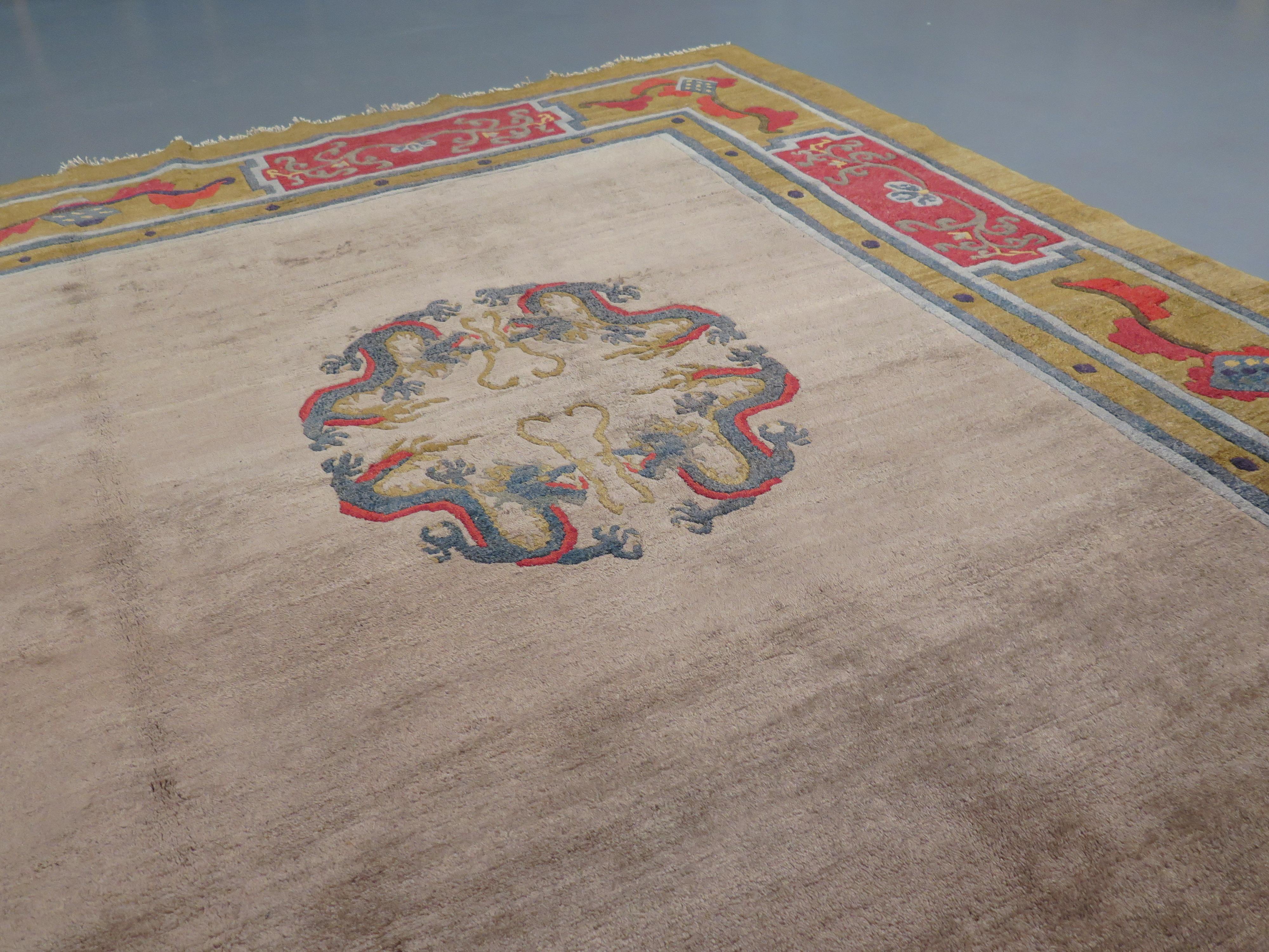 Though very few antique examples have survived, the tradition of Mongolian carpet weaving goes back many centuries, inspired in part by the designs of Chinese textiles, borrowing certain characteristic designs, including images of tigers, Buddhist