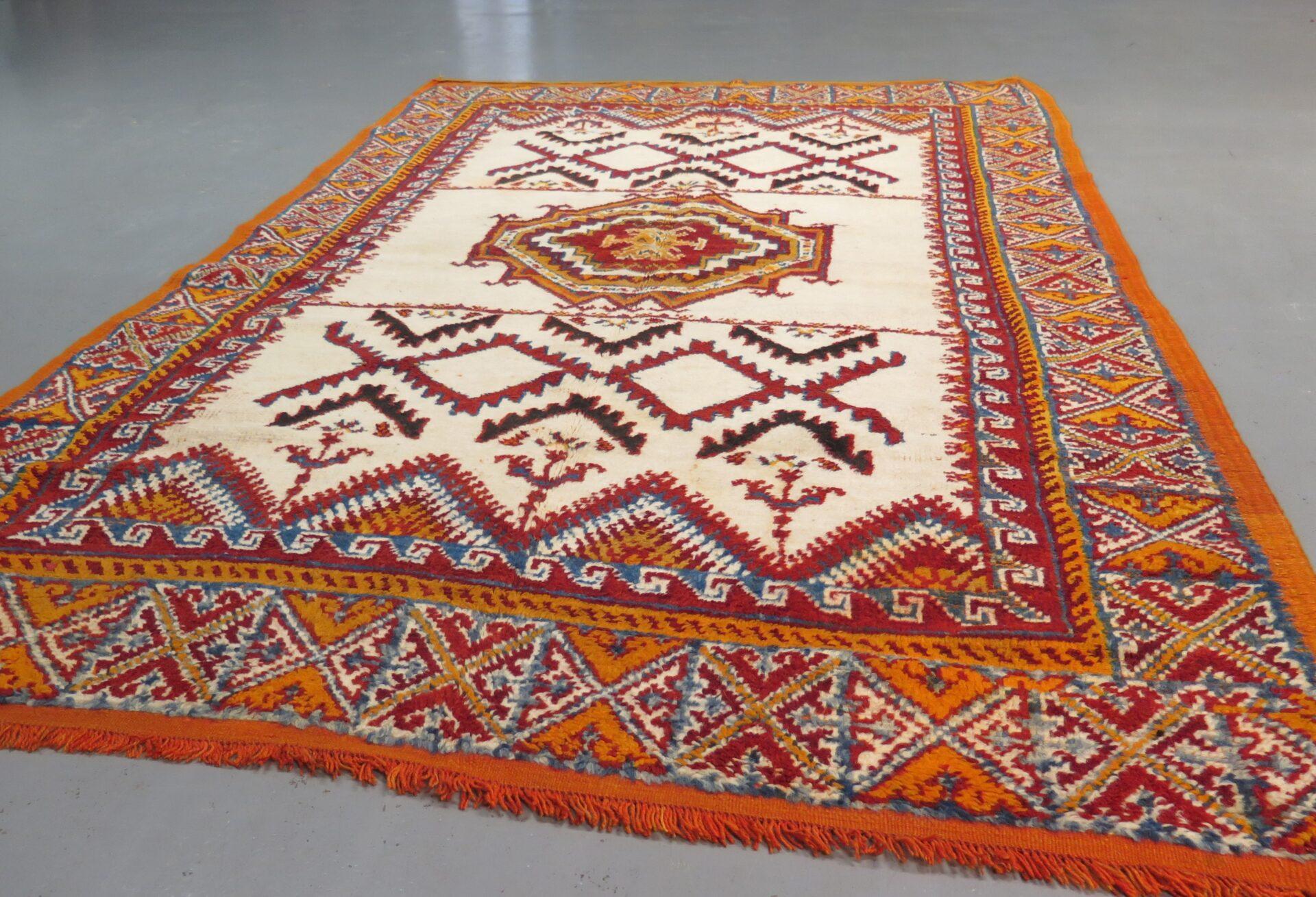 An early 20th Century Moroccan carpet, hand-knotted in high-grade wool - these pieces have been handwoven by the Berber peoples of the Atlas Mountains for generations, though in the 20th Century, in particular, became a staple of Modernist design,