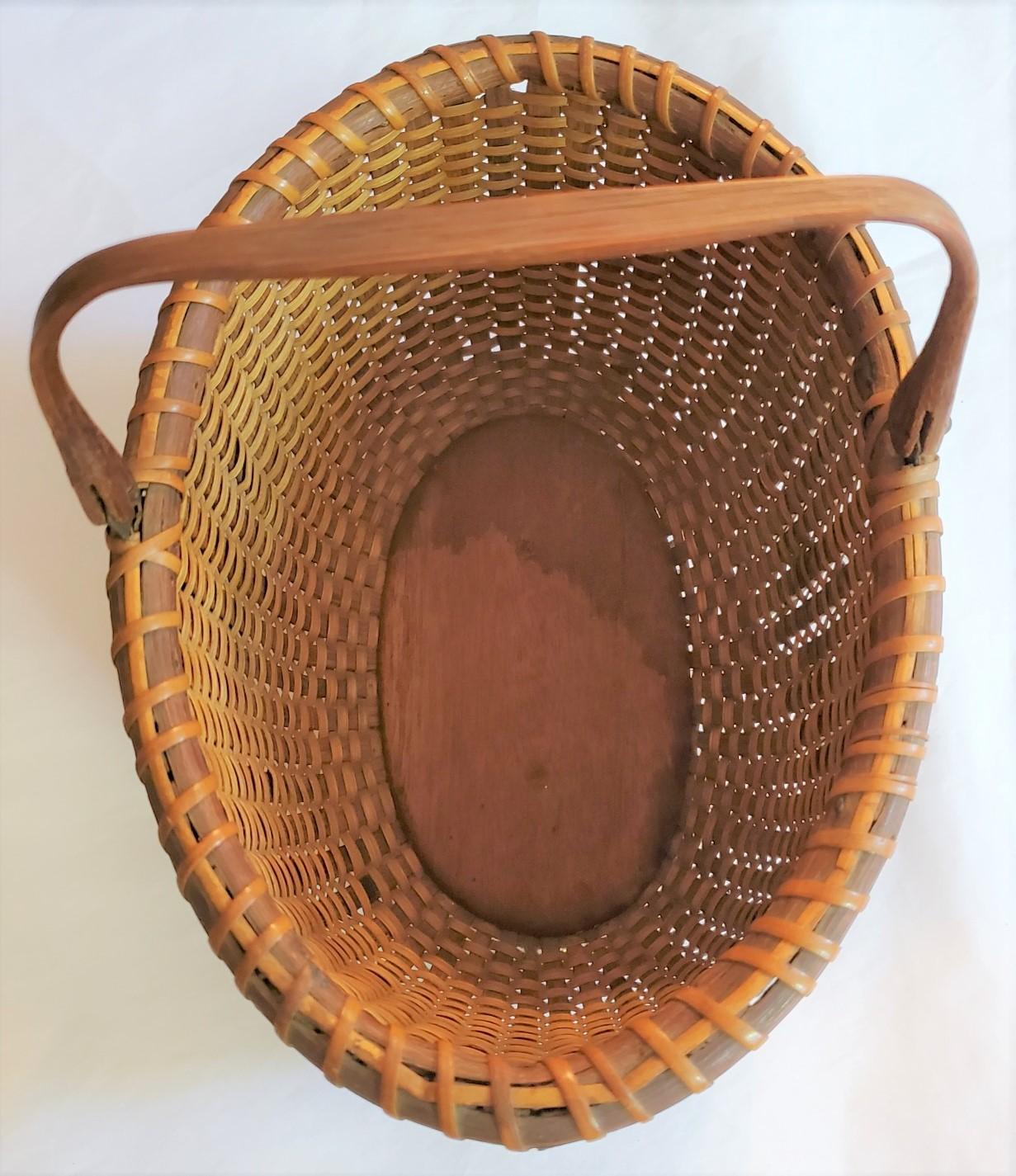 Cane Early 20th Century Nantucket Oval Basket by A.D. Williams, circa 1920