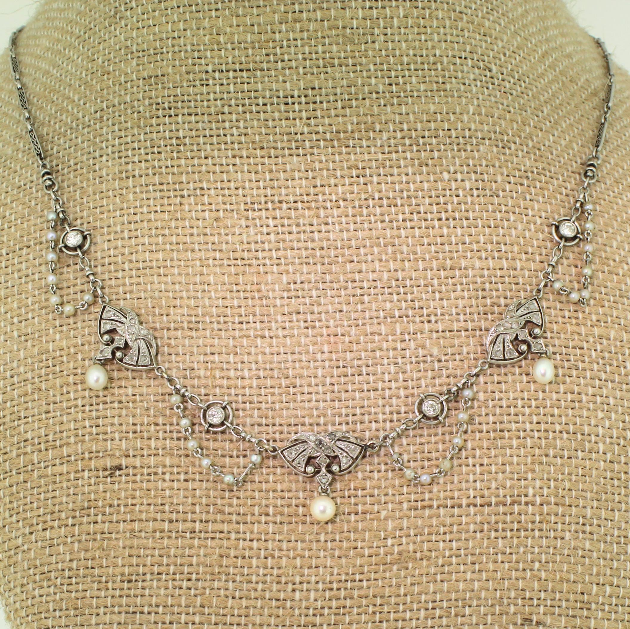 Early 20th Century Natural Pearl and Diamond Platinum Necklace In Good Condition For Sale In Essex, GB