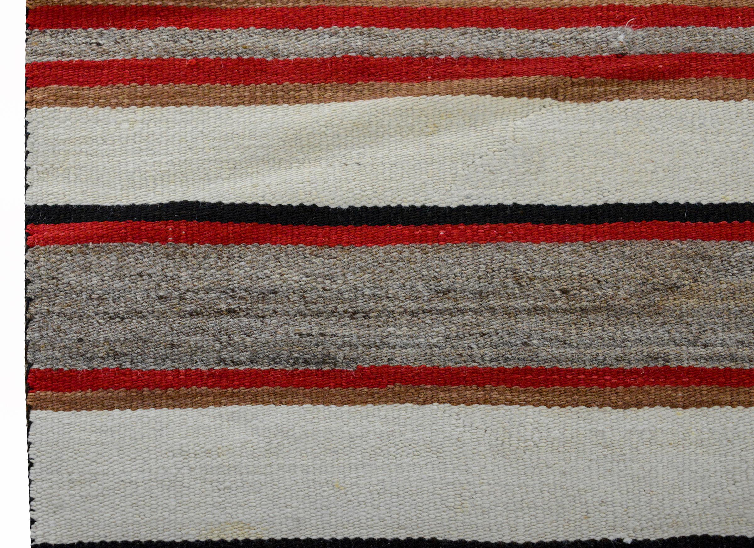 Navajo-Teppich des frühen 20. Jahrhunderts (Indigene Kunst (Nord-/Südamerika)) im Angebot