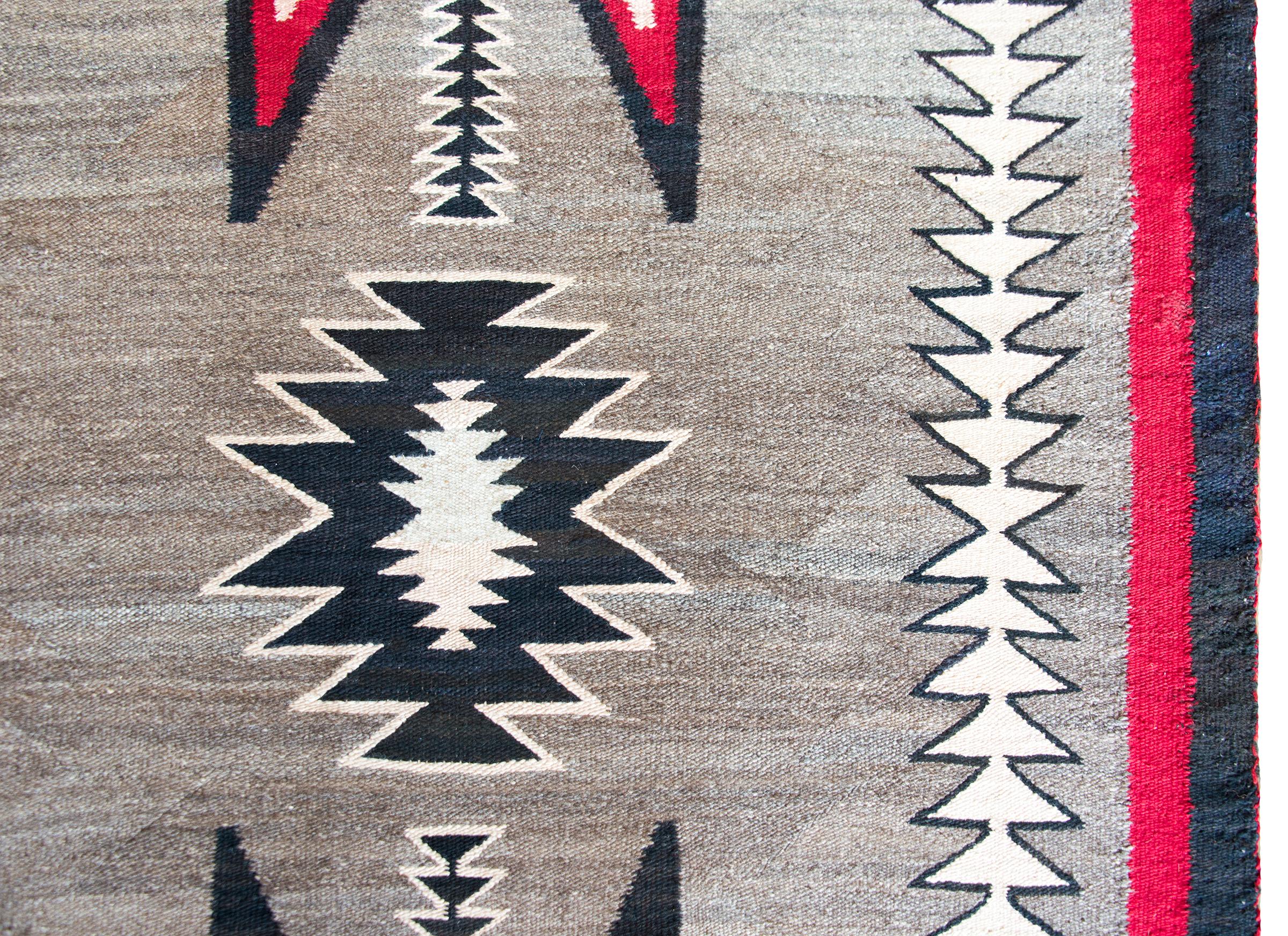 Hand-Knotted Early 20th Century Navajo Rug For Sale