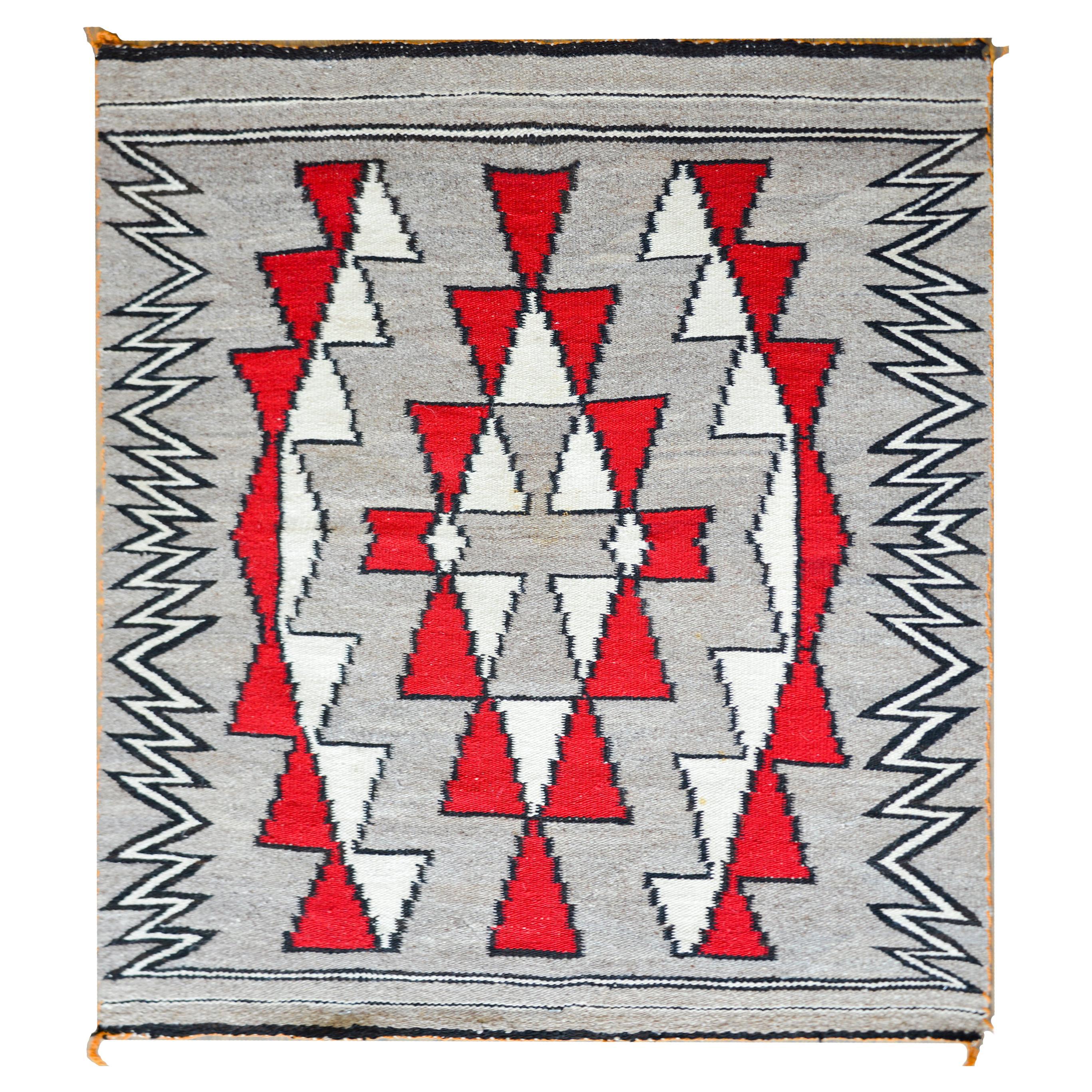 Alfombra Navajo de principios del siglo XX
