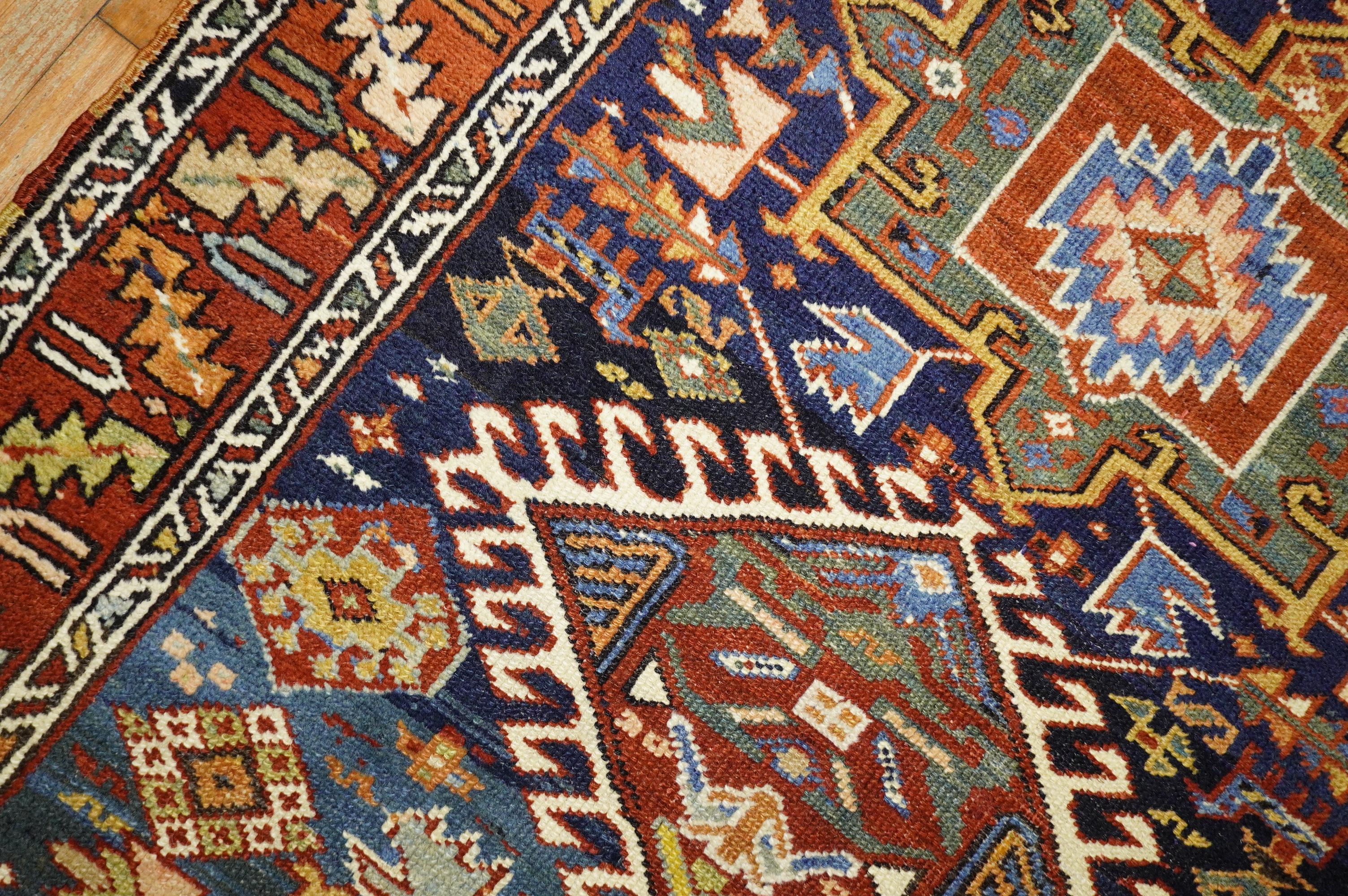 Early 20th Century Navy Ground Scatter Size Persian Oriental Heriz Rug In Excellent Condition For Sale In New York, NY