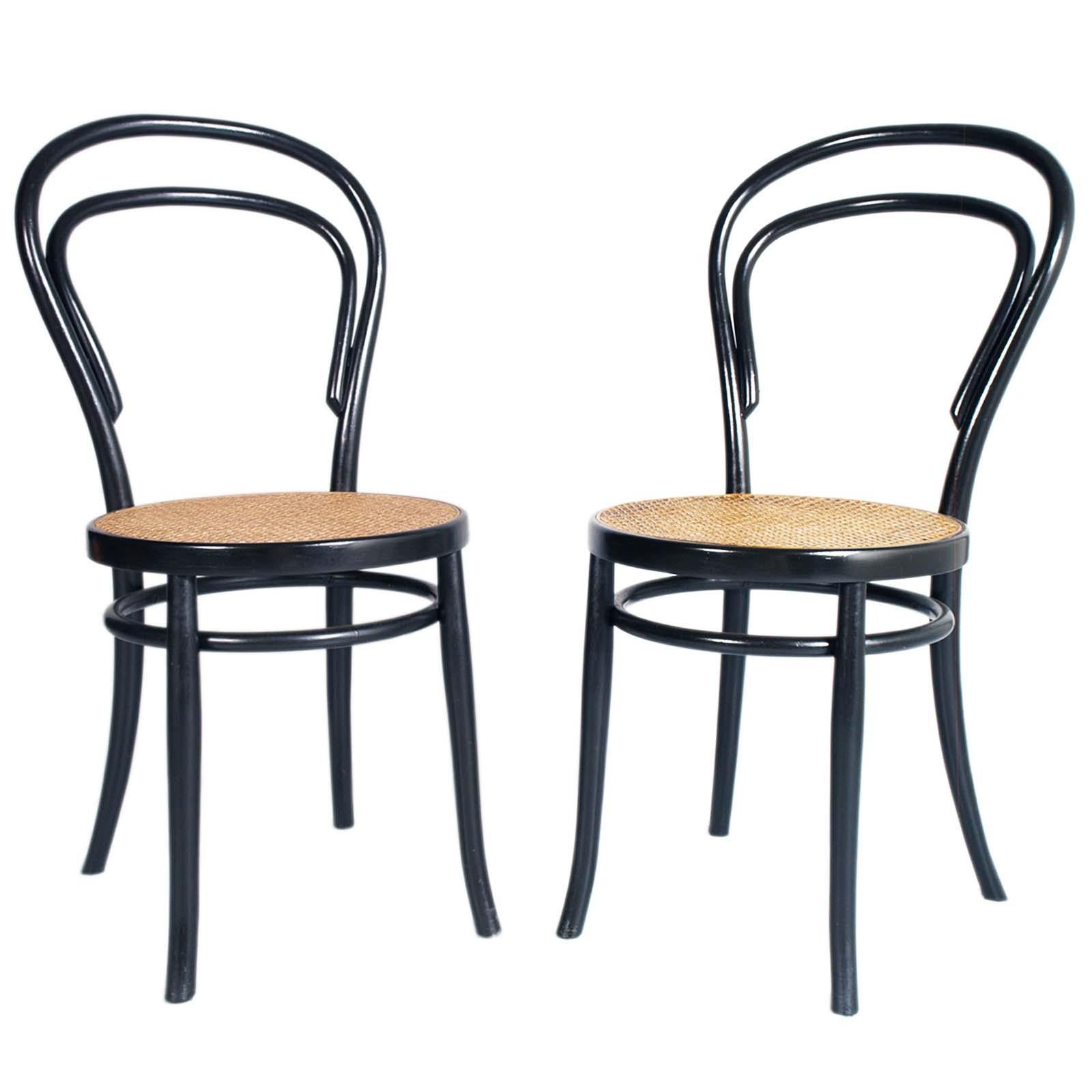 Early 20th century set four Thonet chairs by Sautto & Liberale, ebonized in curved beech.

Naples is a capital of the Thonet style in an Italian version with a beautiful story to tell.
Sautto e Liberale is the most important company. Born from the