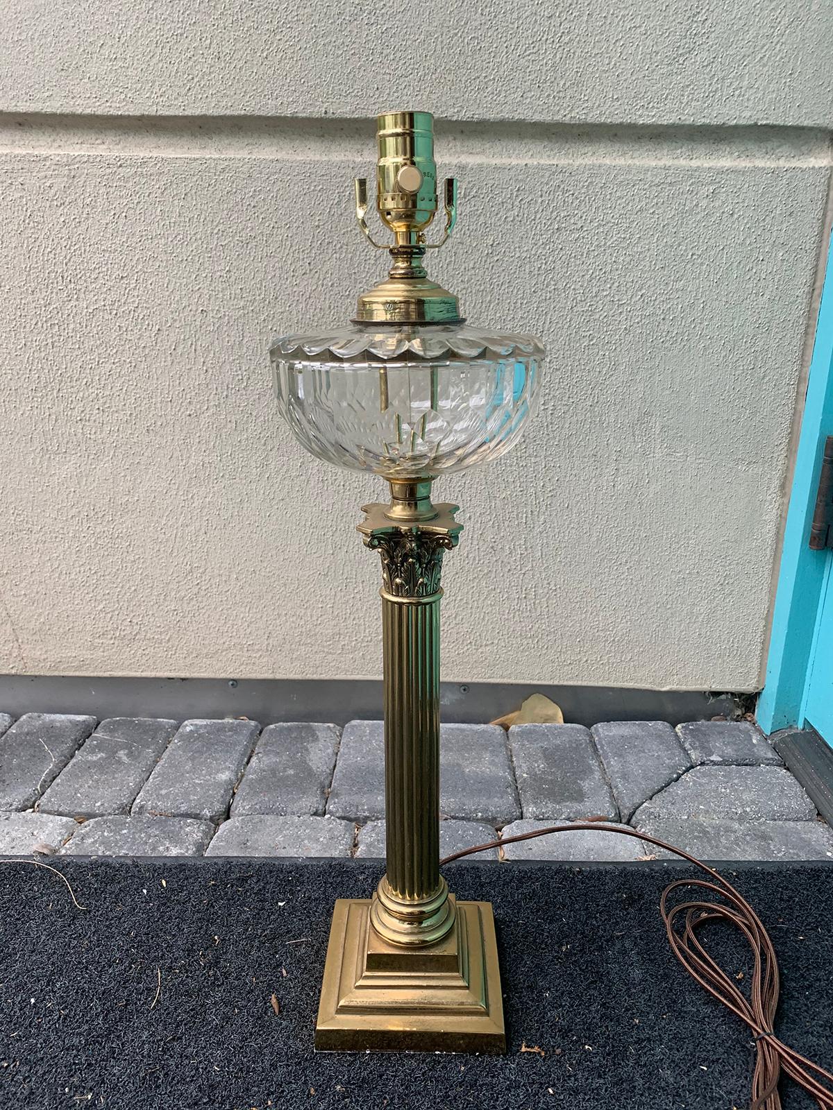 Early 20th century neoclassical bronze column lamp with crystal oil font.