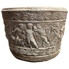 Early 20th Century Neoclassical Carved Stone Pot with Putti Motif
