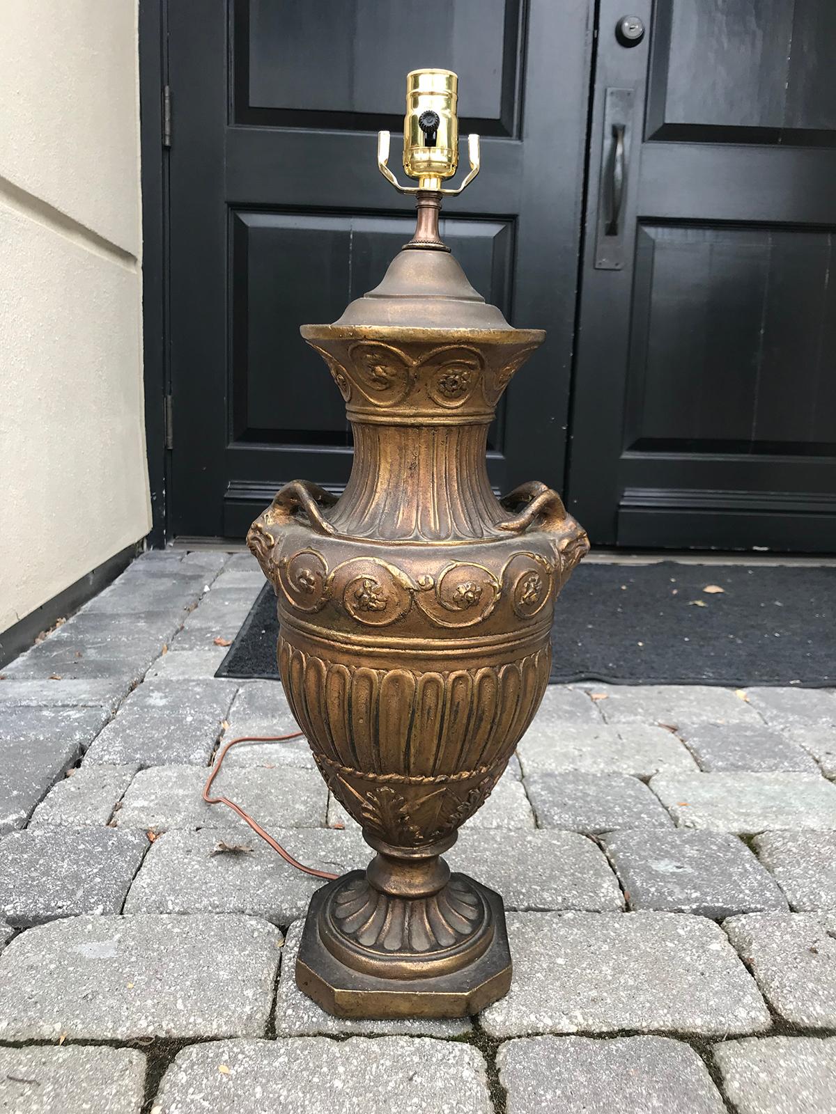 Early 20th century neoclassical gilt Repousee urn lamp
very elegant
new wiring.