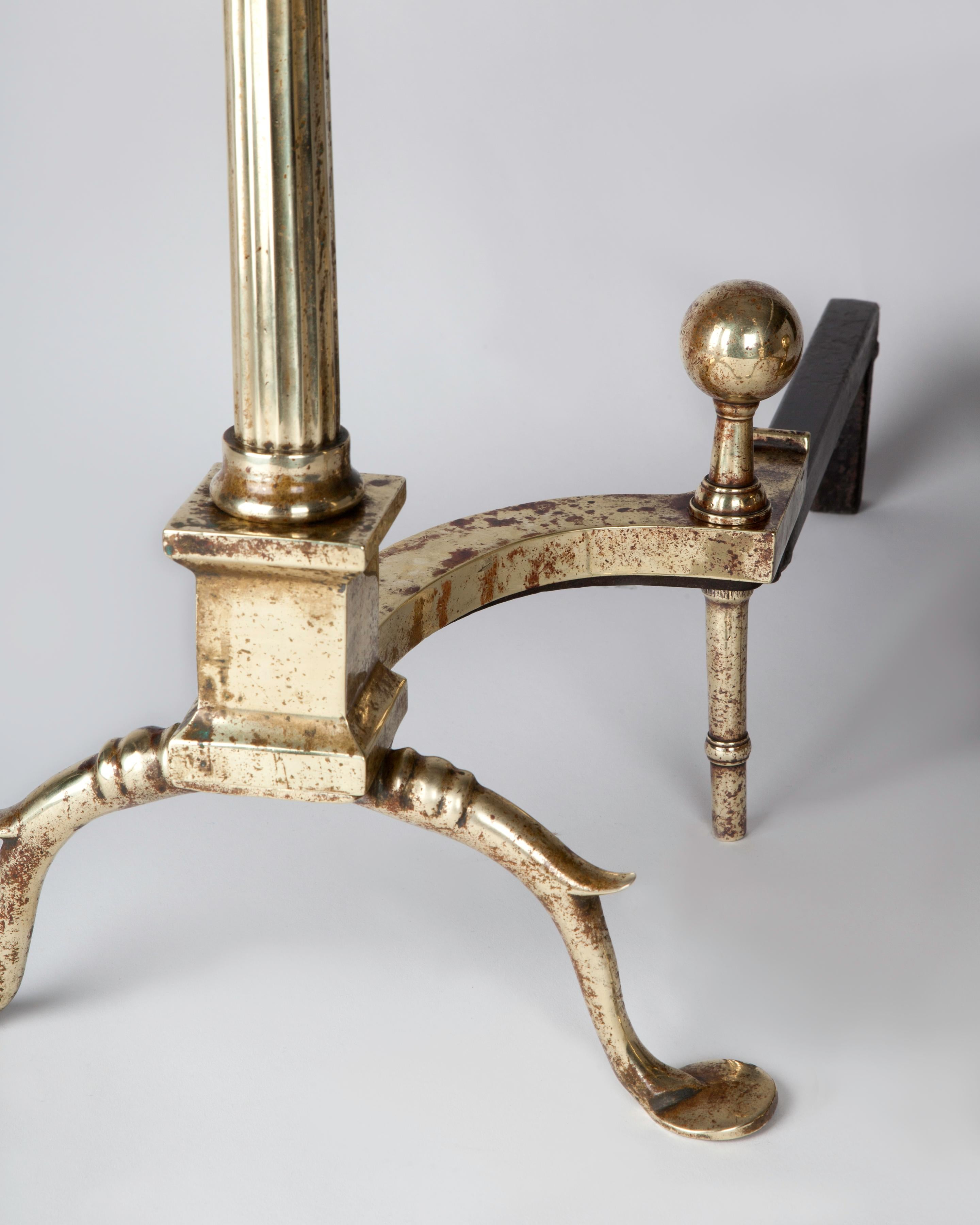 Early 20th Century Neoclassical Polished Brass Andirons With Fluted Columns In Fair Condition For Sale In New York, NY