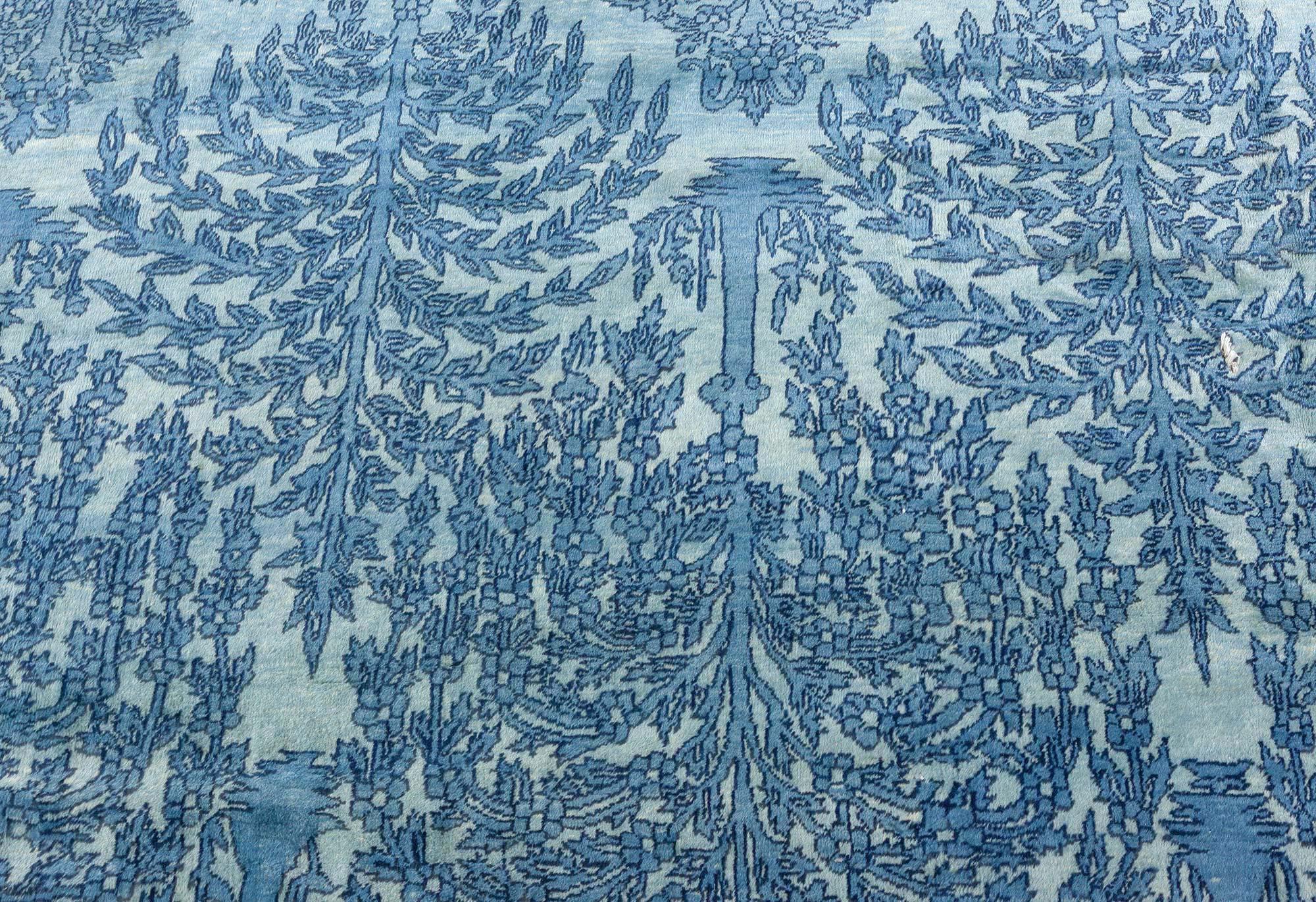 Early 20th Century North Indian Blue Botanic Hand Knotted Wool Rug In Good Condition For Sale In New York, NY