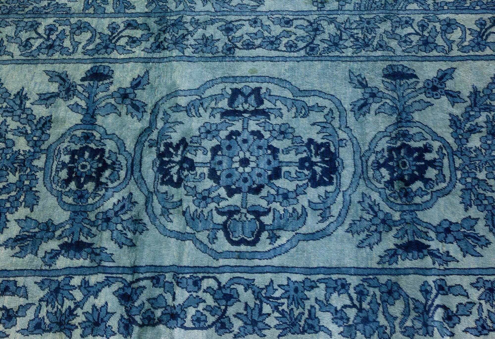 Early 20th Century North Indian Blue Botanic Hand Knotted Wool Rug For Sale 1