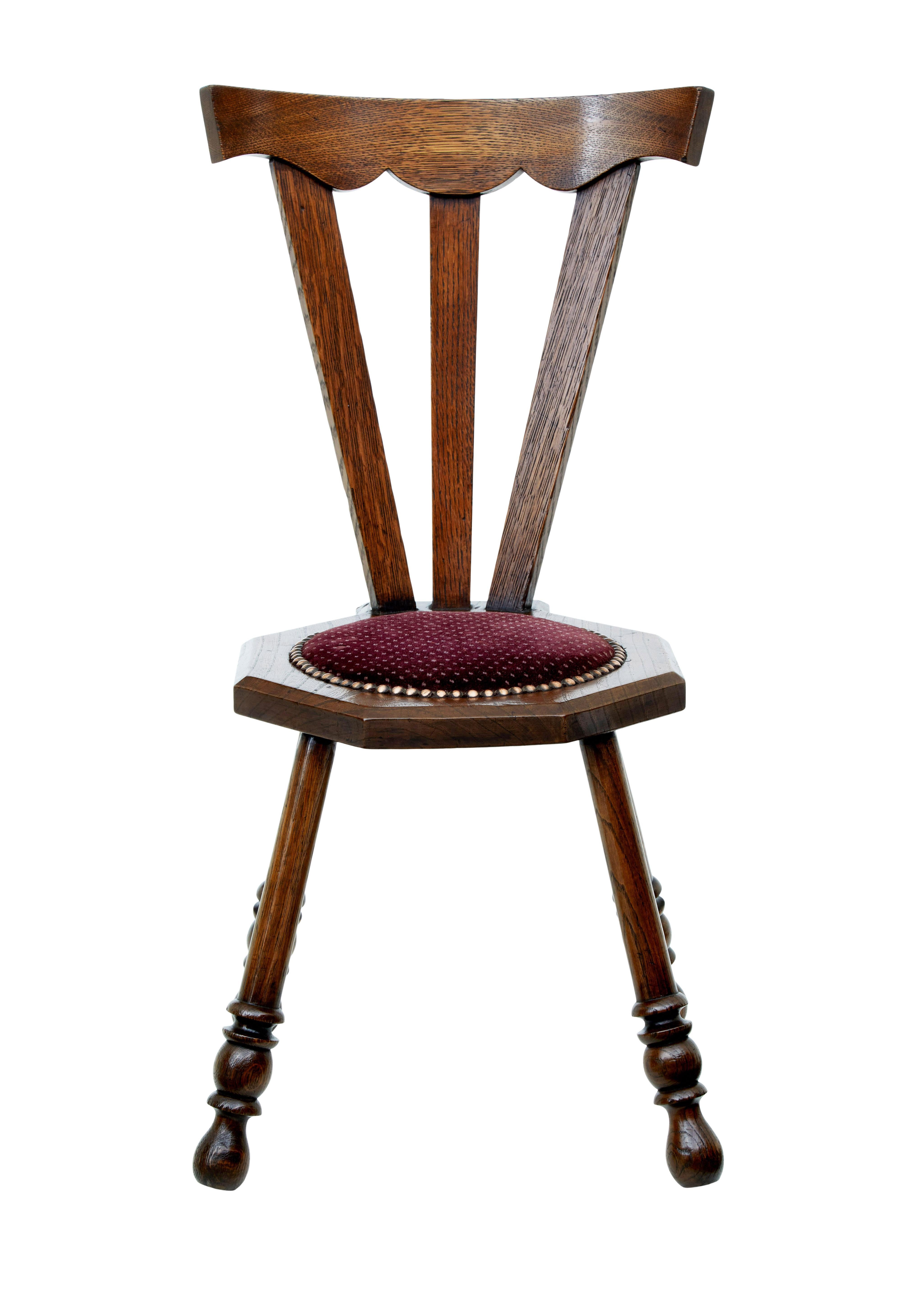 Early 20th century oak arts and crafts childs chair circa 1920.

Small children's chair in the arts and crafts style. Octagonal seat standing on turned legs, ideal for displaying that important teddy bear.

Seat would need upholstery cleaning or
