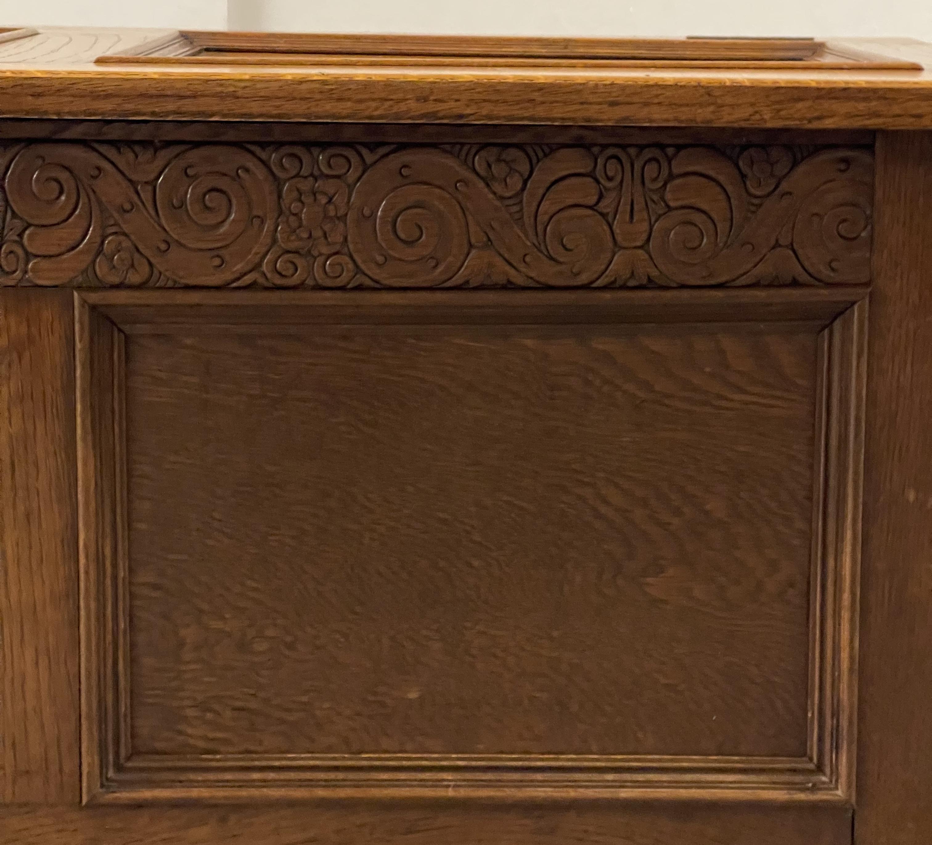 Early 20th Century Oak Blanket Chest Trunk With Scroll Carved Detailing For Sale 6