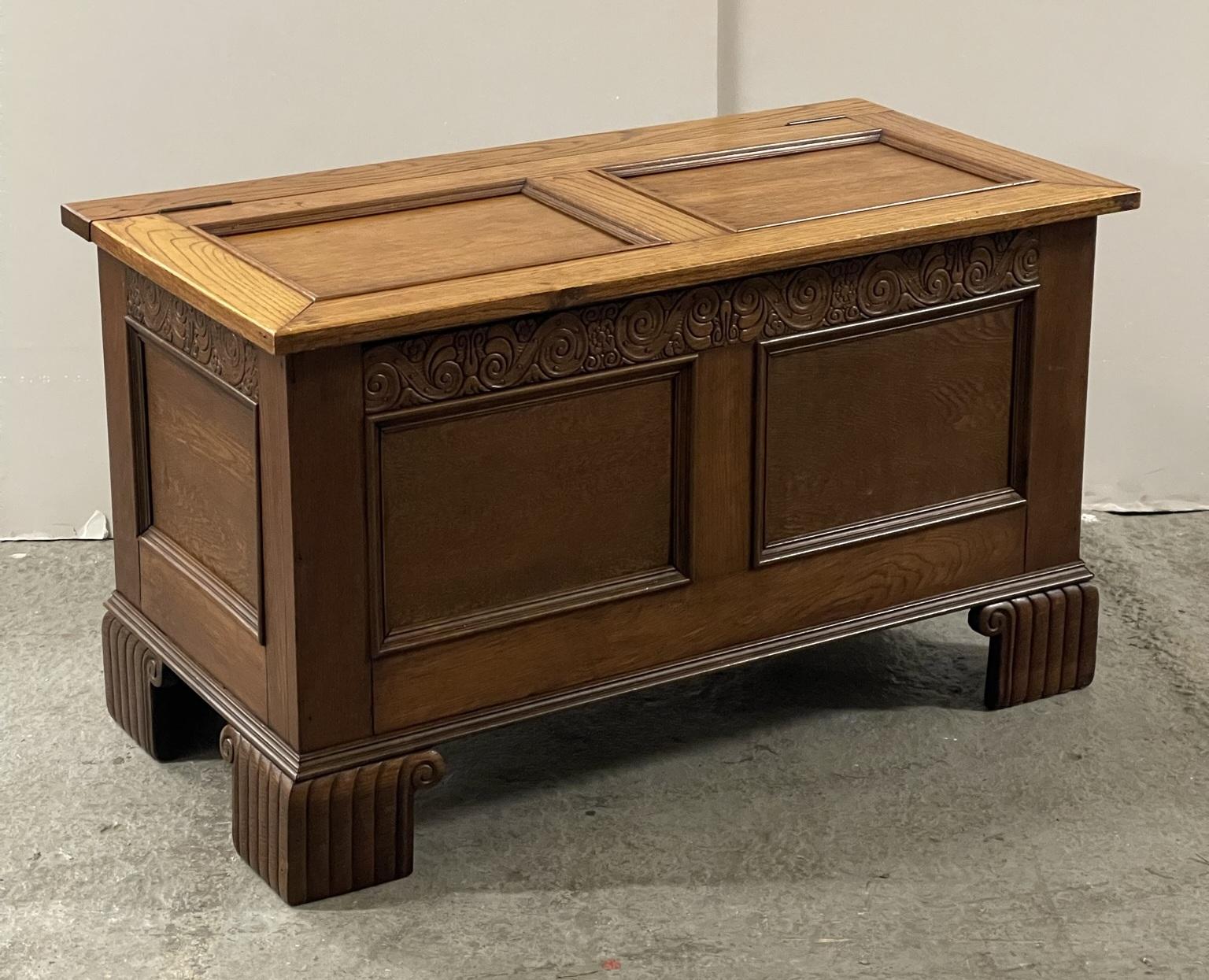 Here we have for sale an early 20th century oak blanket chest on bracket feet with scroll-carved detailing.

Overall, the chest is in great condition with a few minor signs of wear, it has been cleaned and polished ready for its new