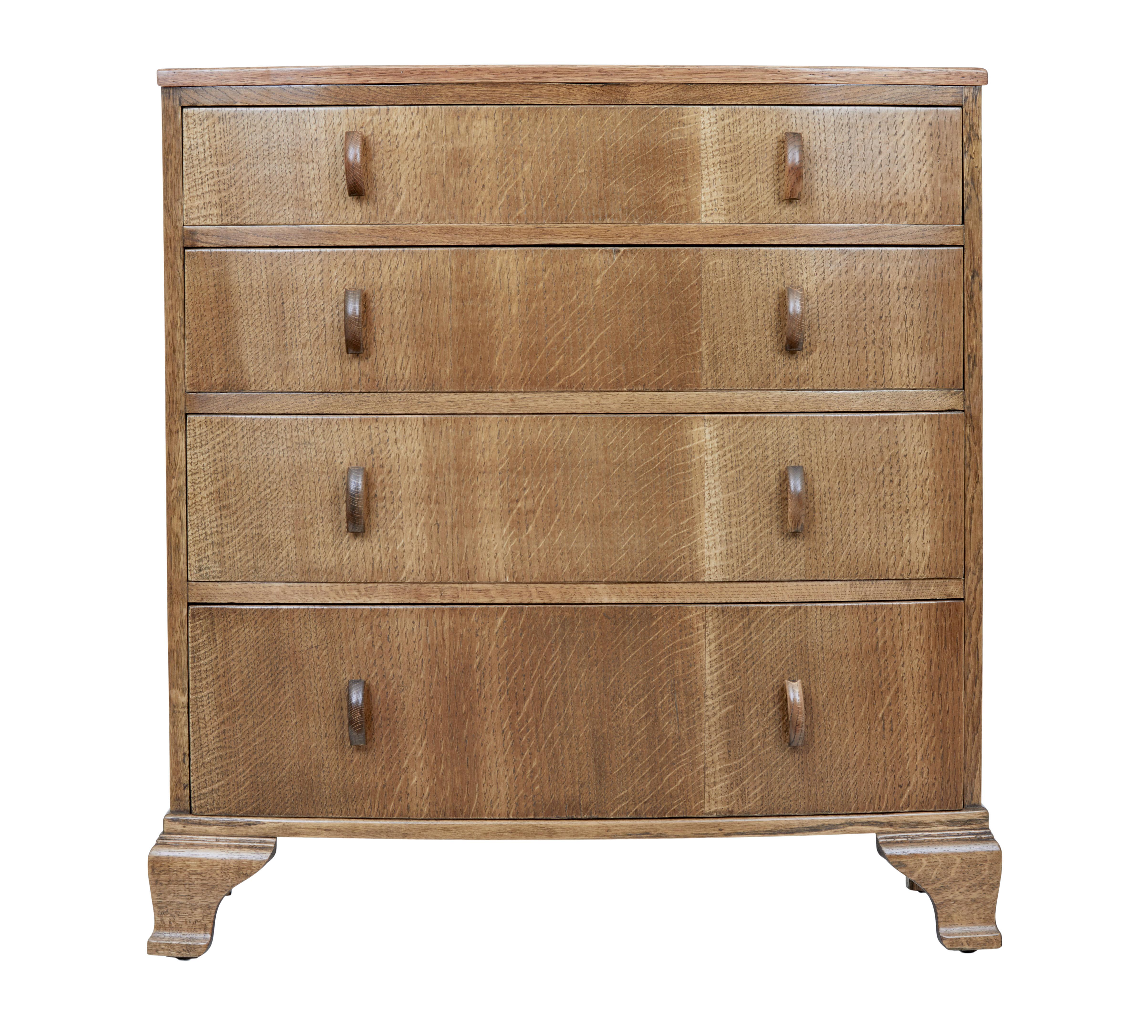 Early 20th century oak bow front chest of drawers, circa 1930.

Good quality English made chest of drawers. Fitted with 4 graduating drawers, each with shaped handles. Each drawer is oak lined which shows a sign of quality.

Standing on bracket