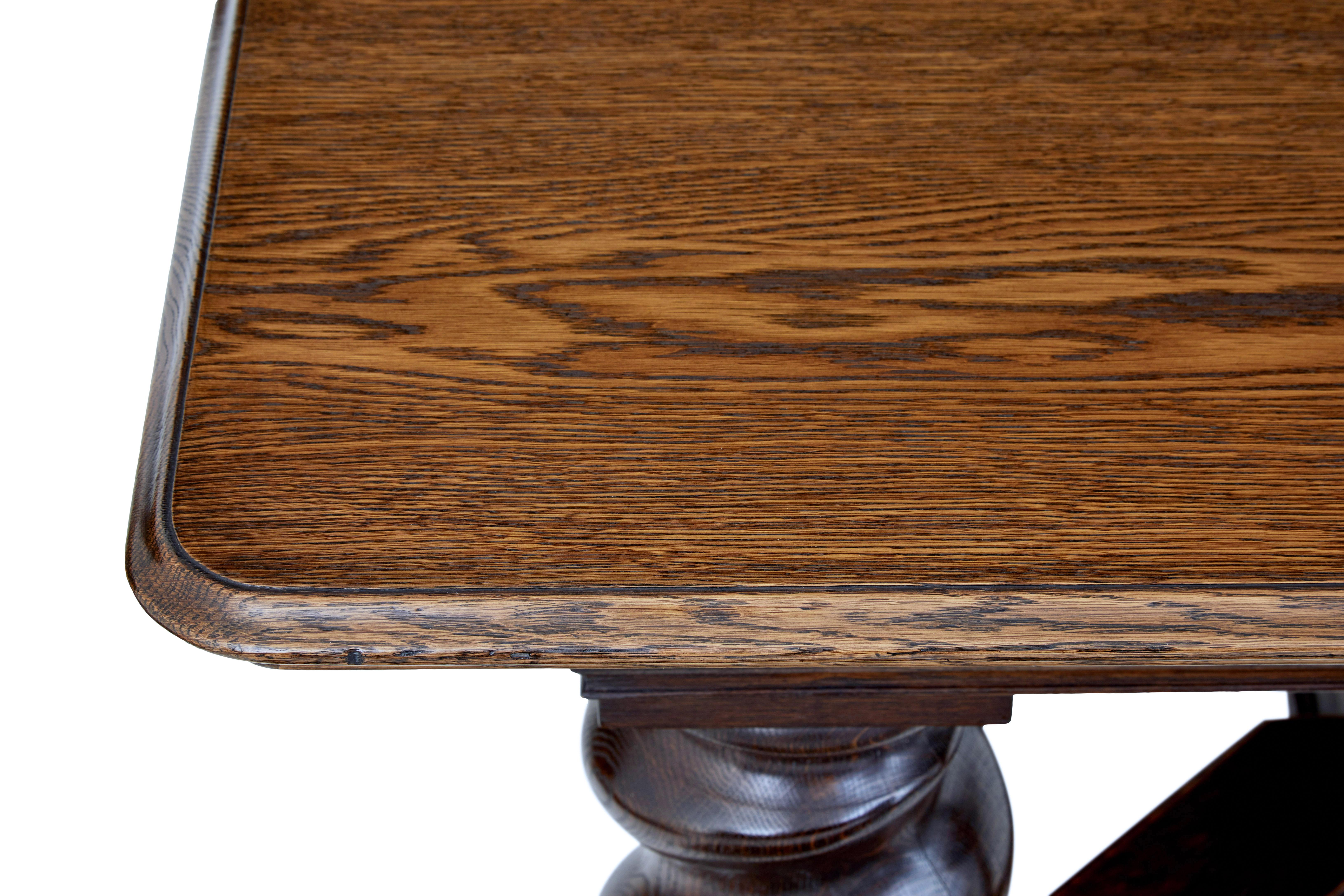Carved Early 20th century oak extending dining table For Sale