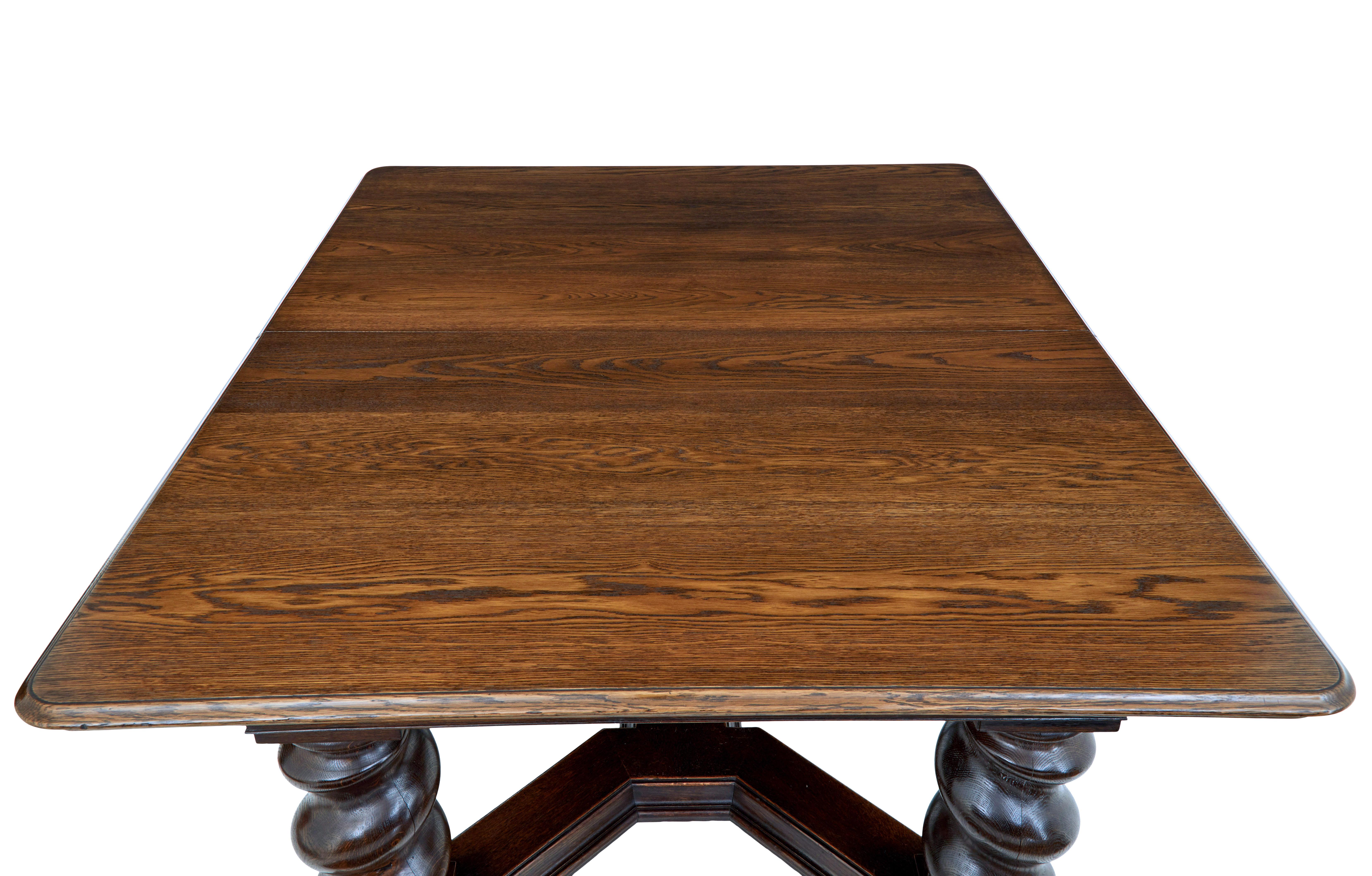 Hand-Carved Early 20th century oak extending dining table For Sale