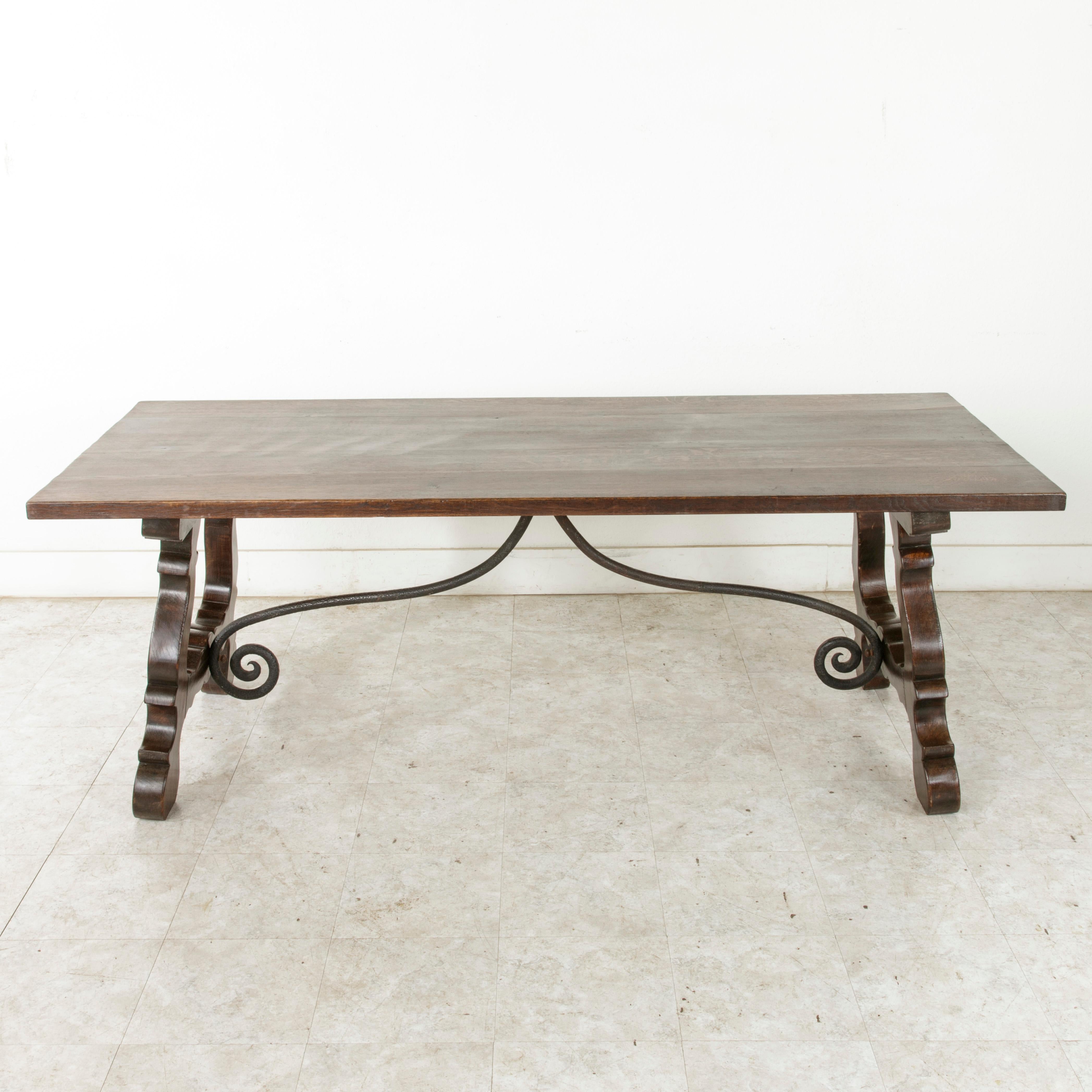 Early 20th Century Oak Spanish Renaissance Style Dining Table, Iron Stretcher 1
