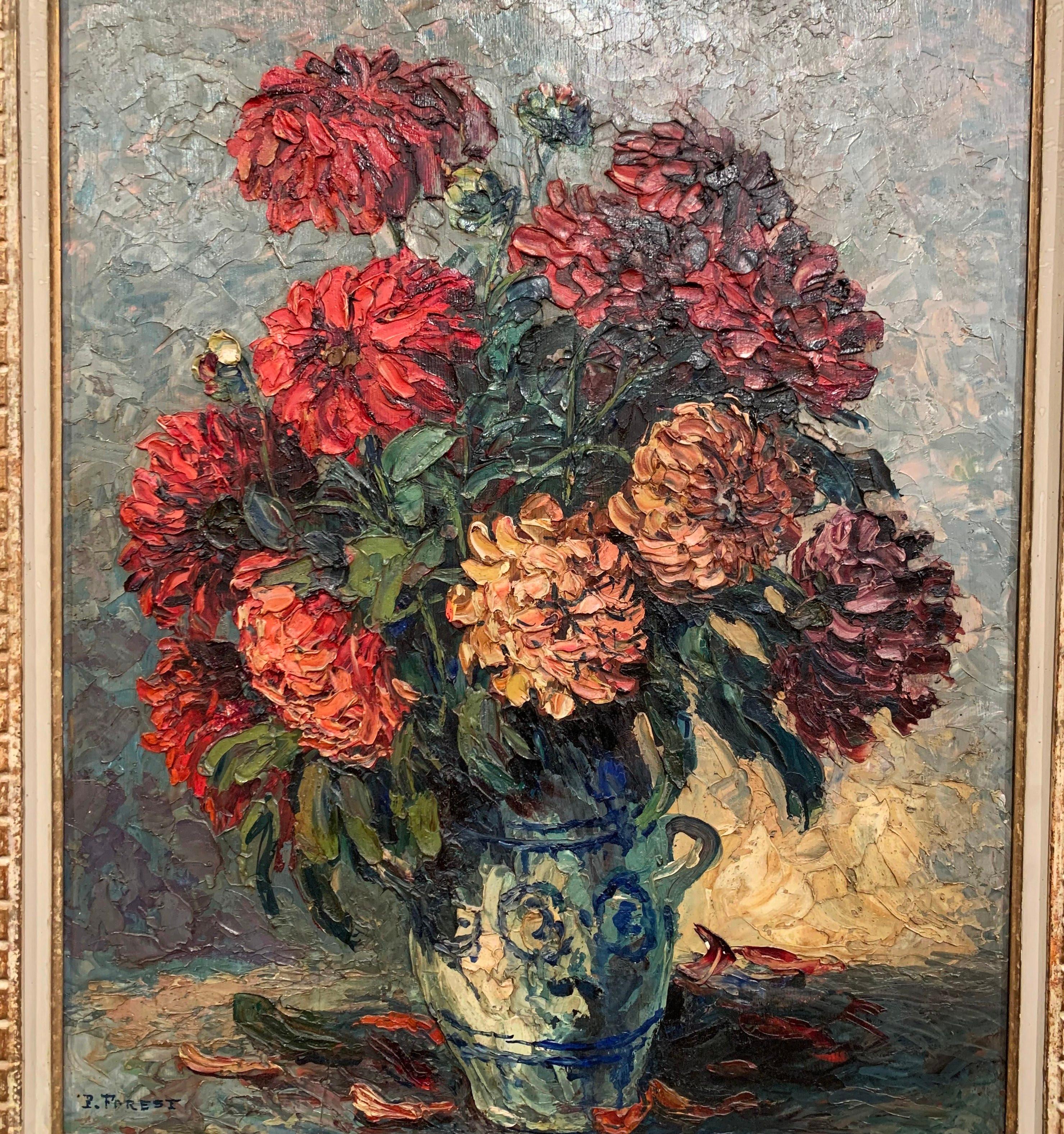 Set in the original carved frame, this large oil on board painting was created in France, circa 1910. The art work depicts a large bouquet of flowers inside a Provencal ceramic vase. The painting is signed in the lower left corner by the artist, P.