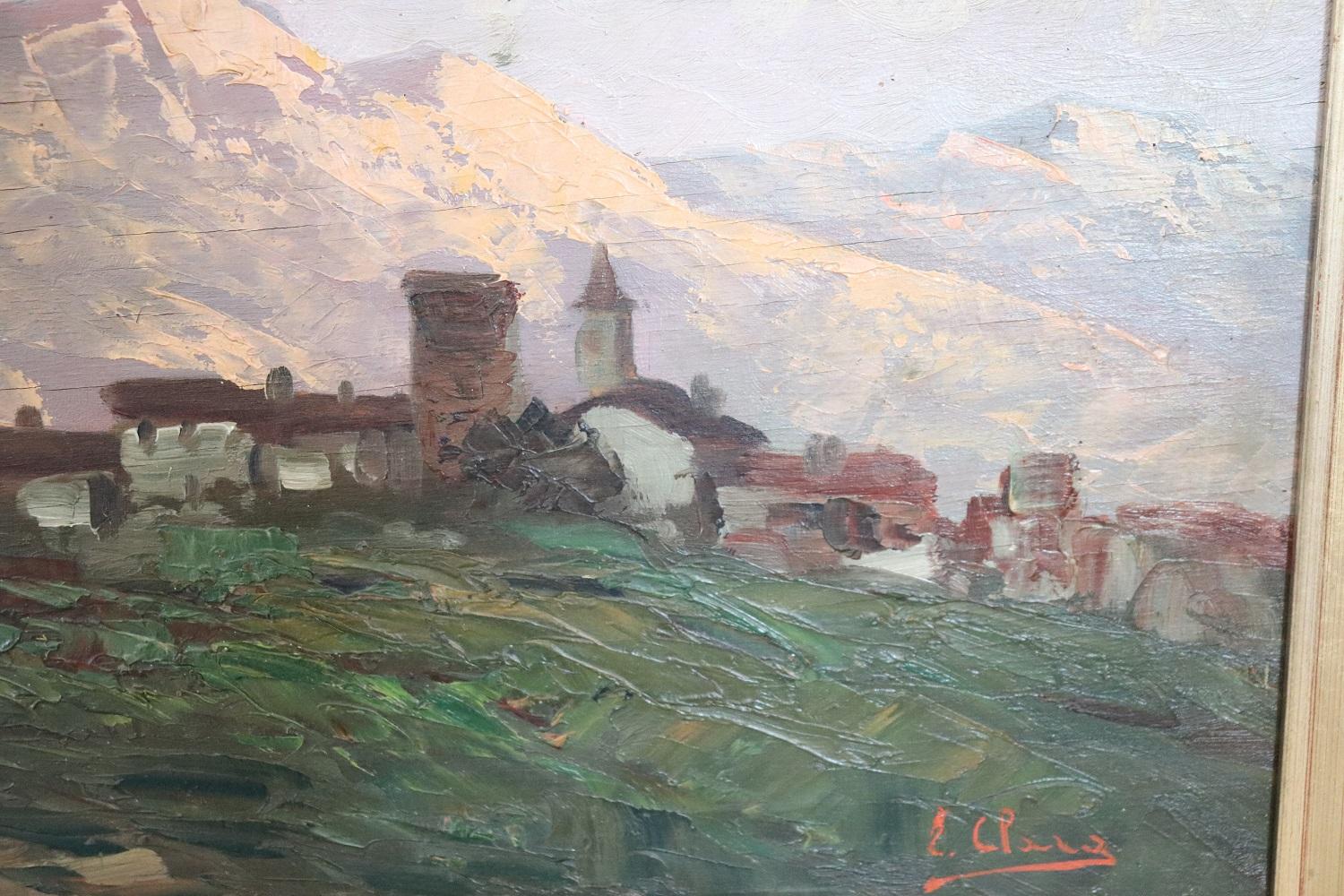 Milieu du XXe siècle Peinture italienne à l'huile sur panneau du début du XXe siècle représentant une ville de montagne, signée en vente