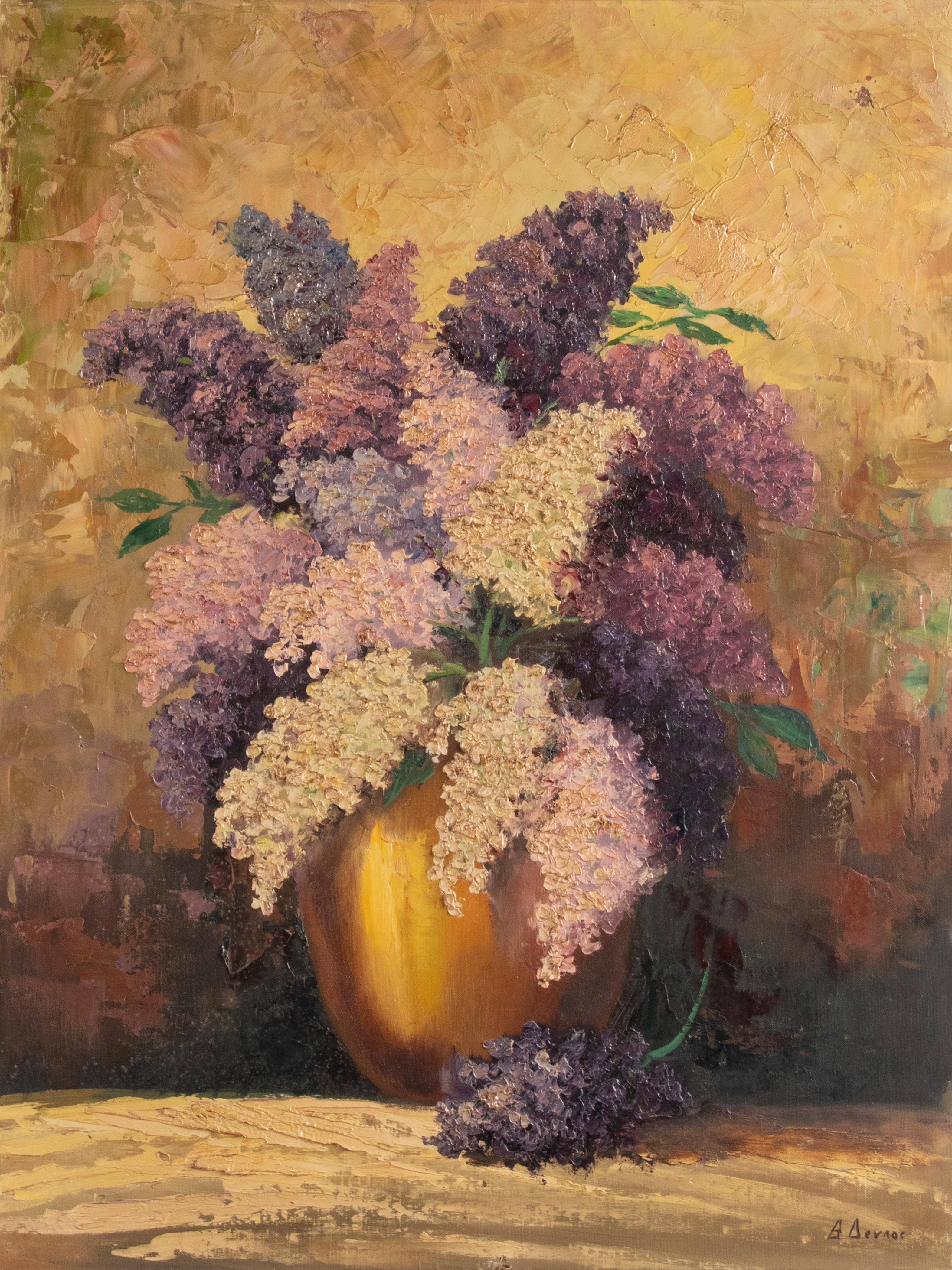 Decorative old painting, oil on canvas, of a flower still life with lilacs. The purple and pink colors of the flowers reflect nicely with the gold colored vase and the atmospheric background. The painting is painted with a somewhat coarse touch, the
