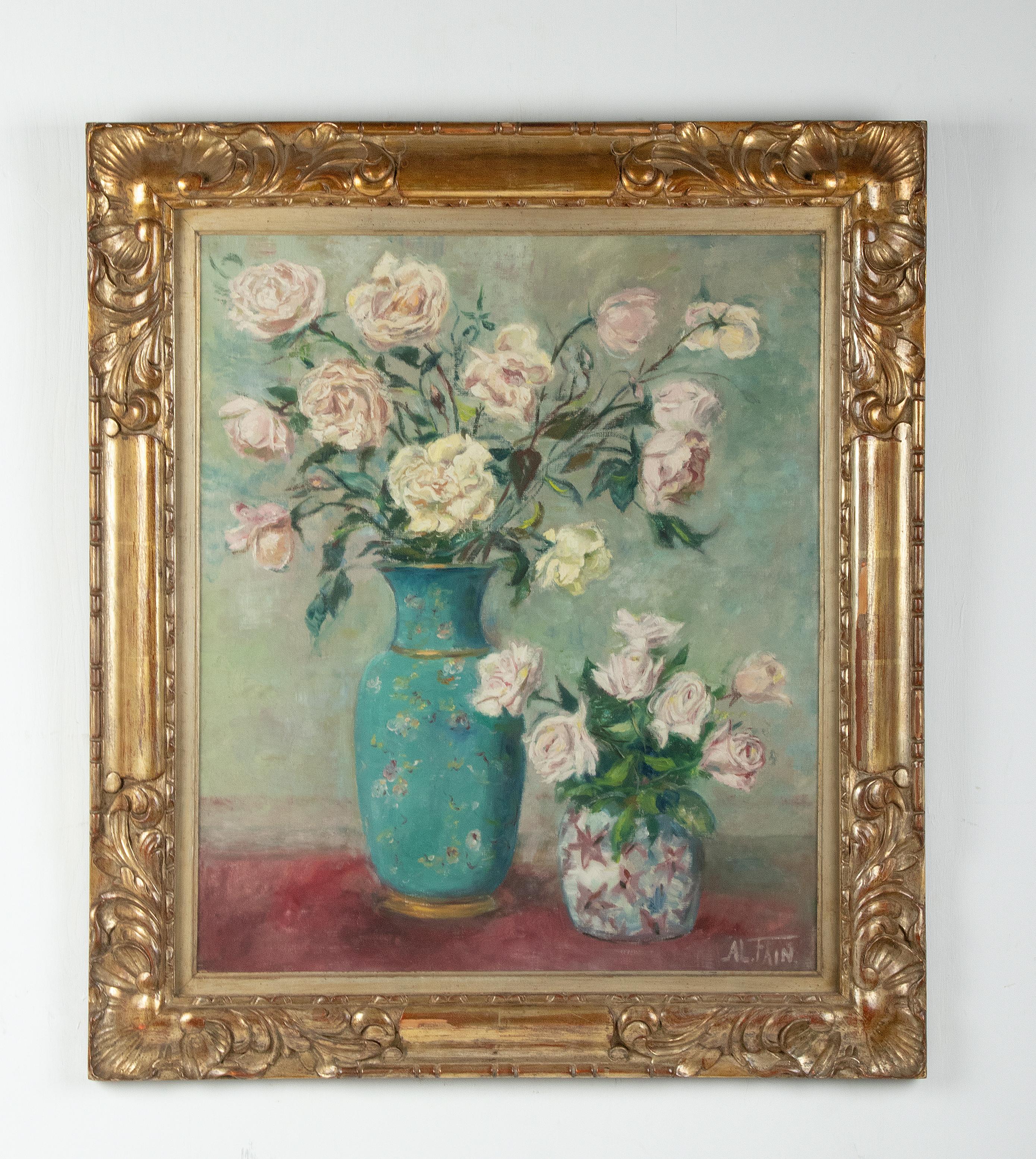 Beautiful antique flower still life, painted by the Belgian artist Alexandre Fain. The painting has beautiful color combinations with pastel shades of green and pink. This combines nicely with the original wooden gilded frame. The painting is framed
