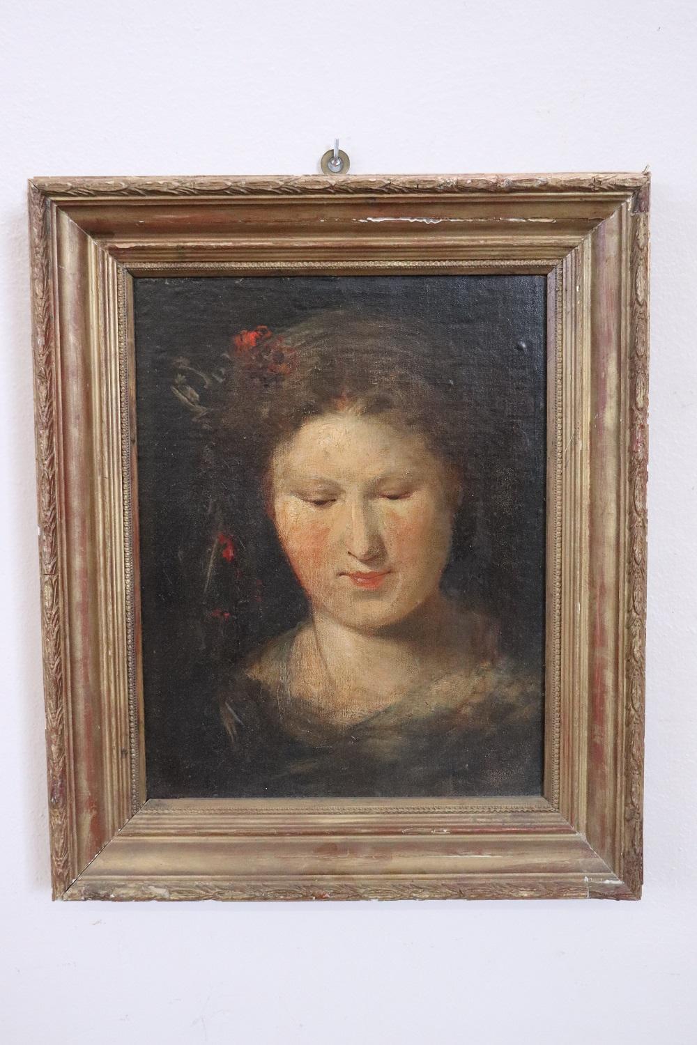Beautiful early 20th century Italian oil painting on board, not signed. Portrait of a young woman. High pictorial quality. Sold with frame.
 