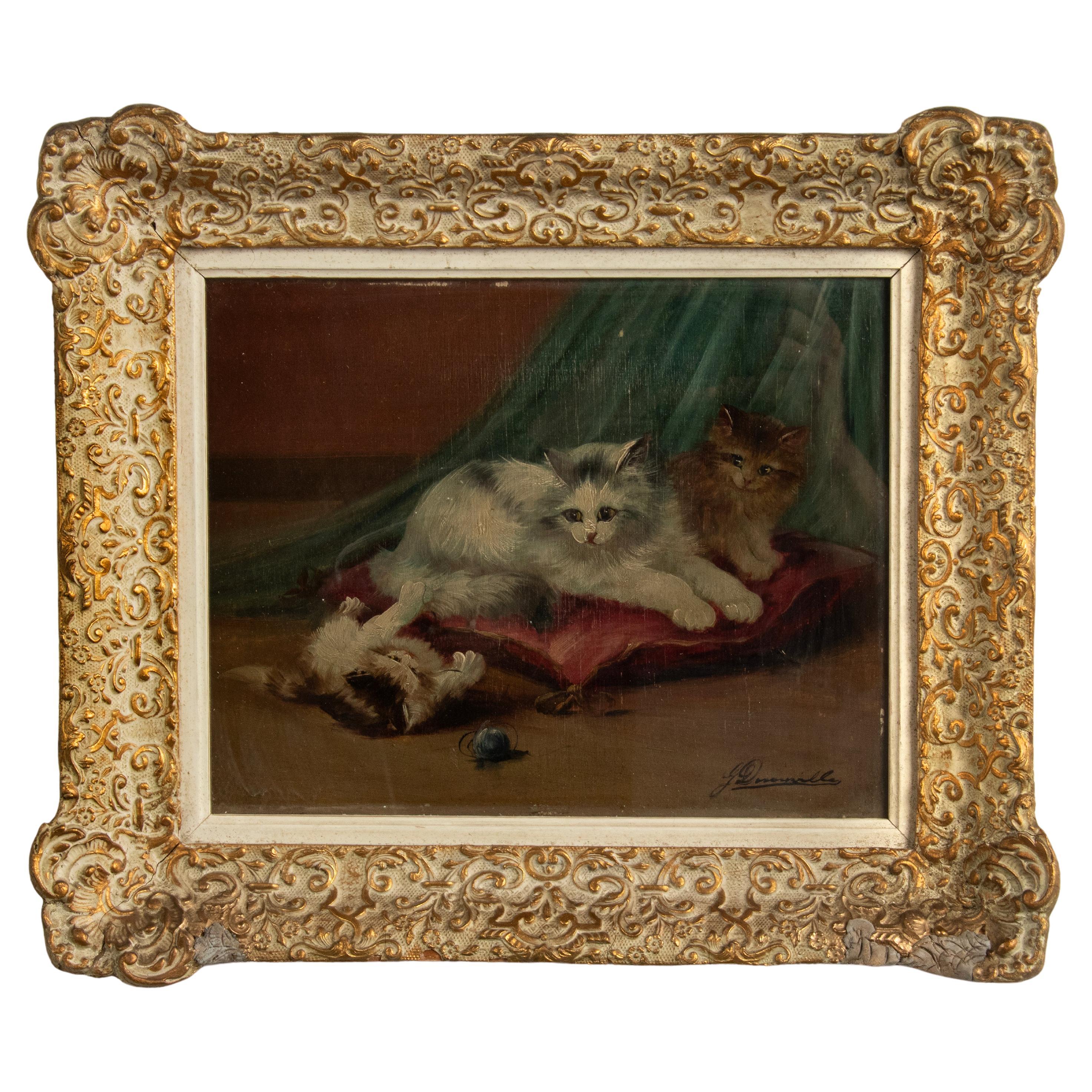 Peinture à l'huile du début du 20e siècle représentant des chats en train de jouer en vente