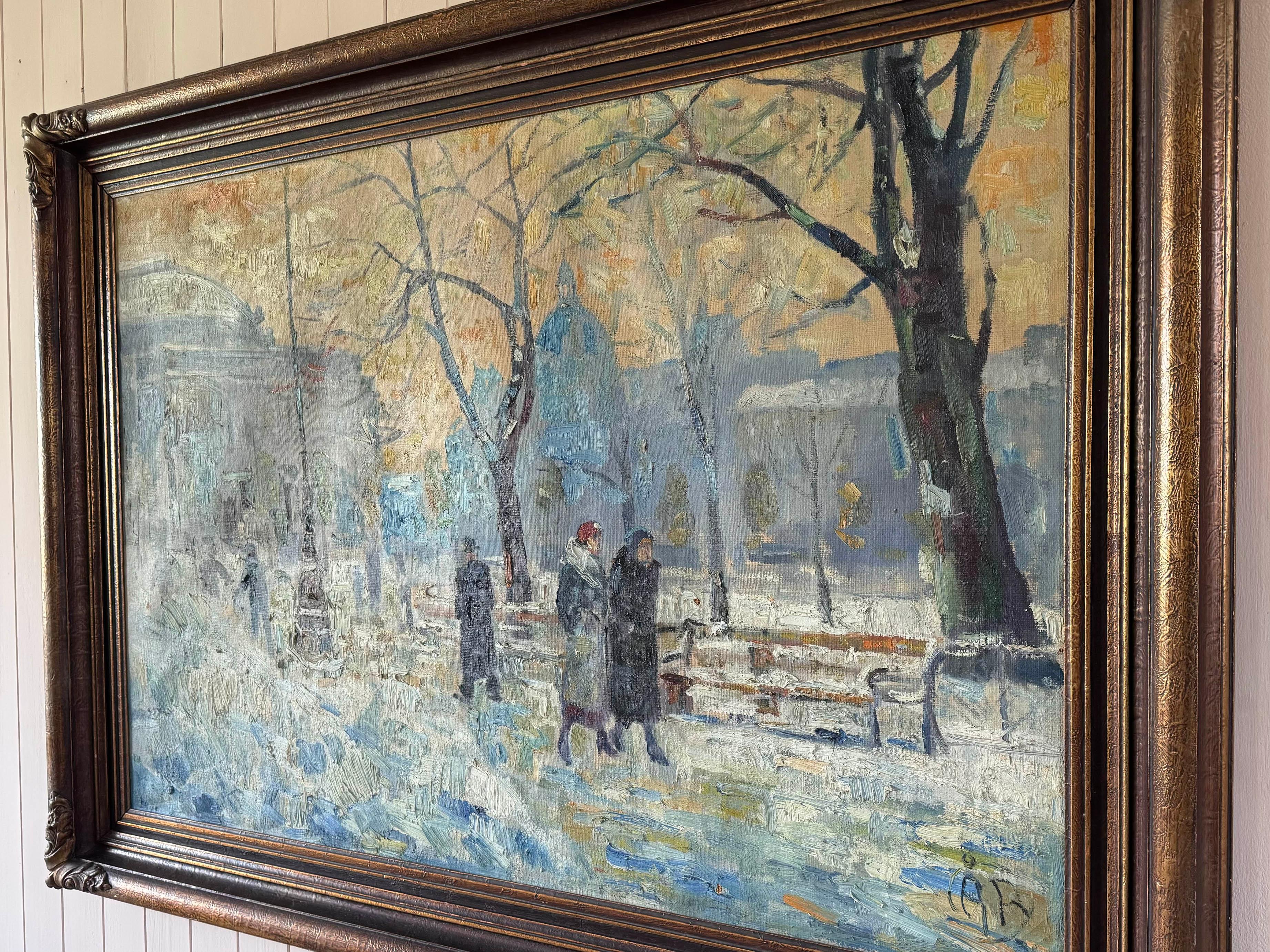 A classic early 20th century oil on canvas painting of an atmospheric winter scene with the recognisable Paris landmarks and elegant French architecture. A serene moment from nearly a century ago, the artist captures a scene that evokes quiet beauty